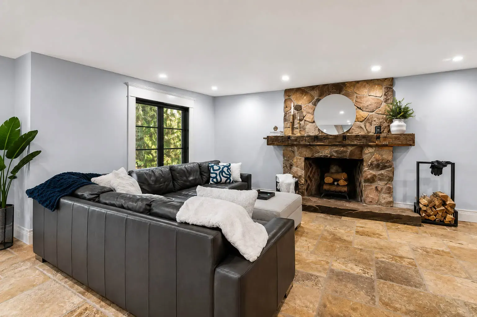 Family room with natural stone fireplace at 816 Norwick Road in Newmarket