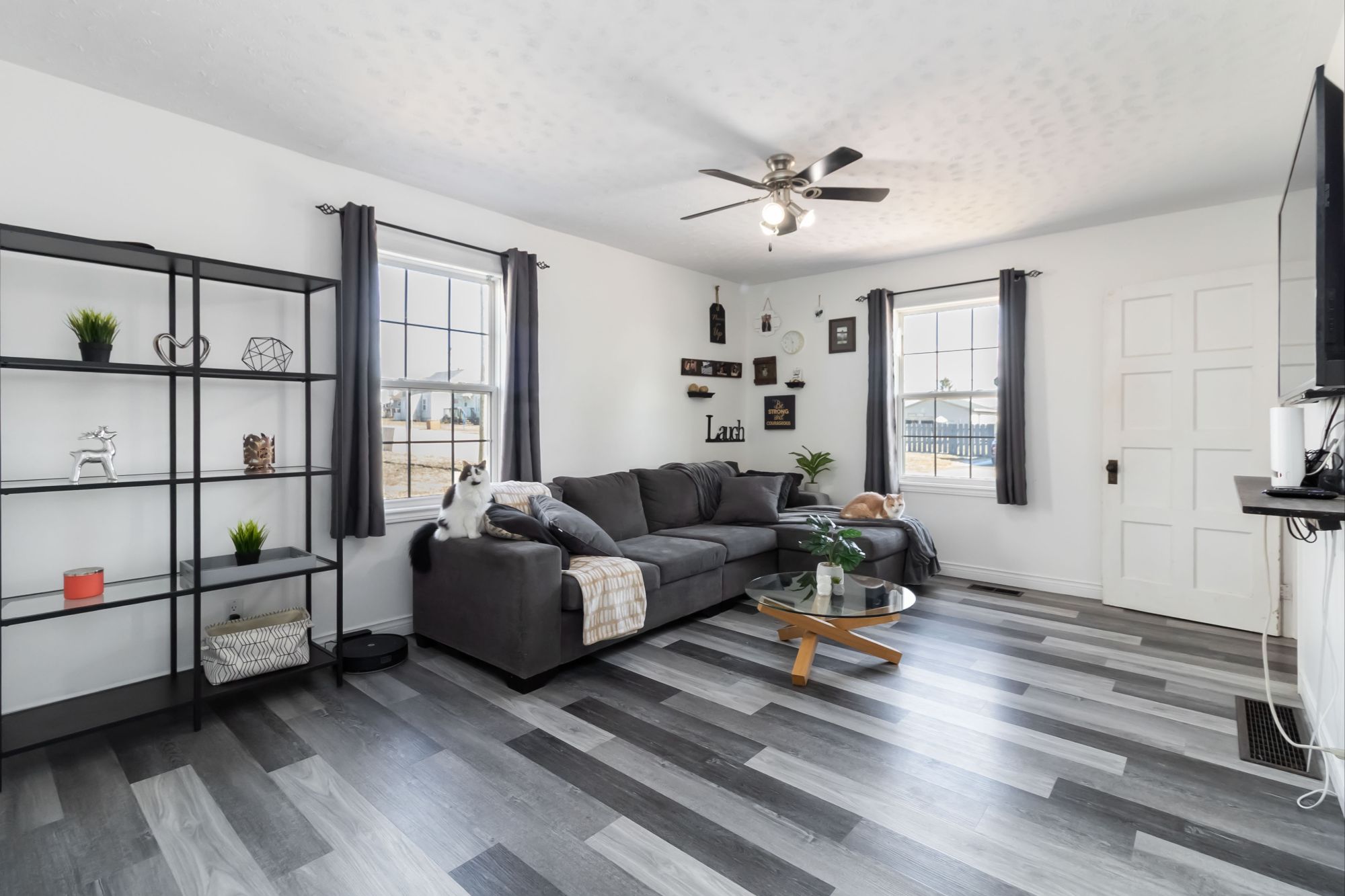 Living Room with Built-in Shelving - 27 Airport Street Dieppe NB