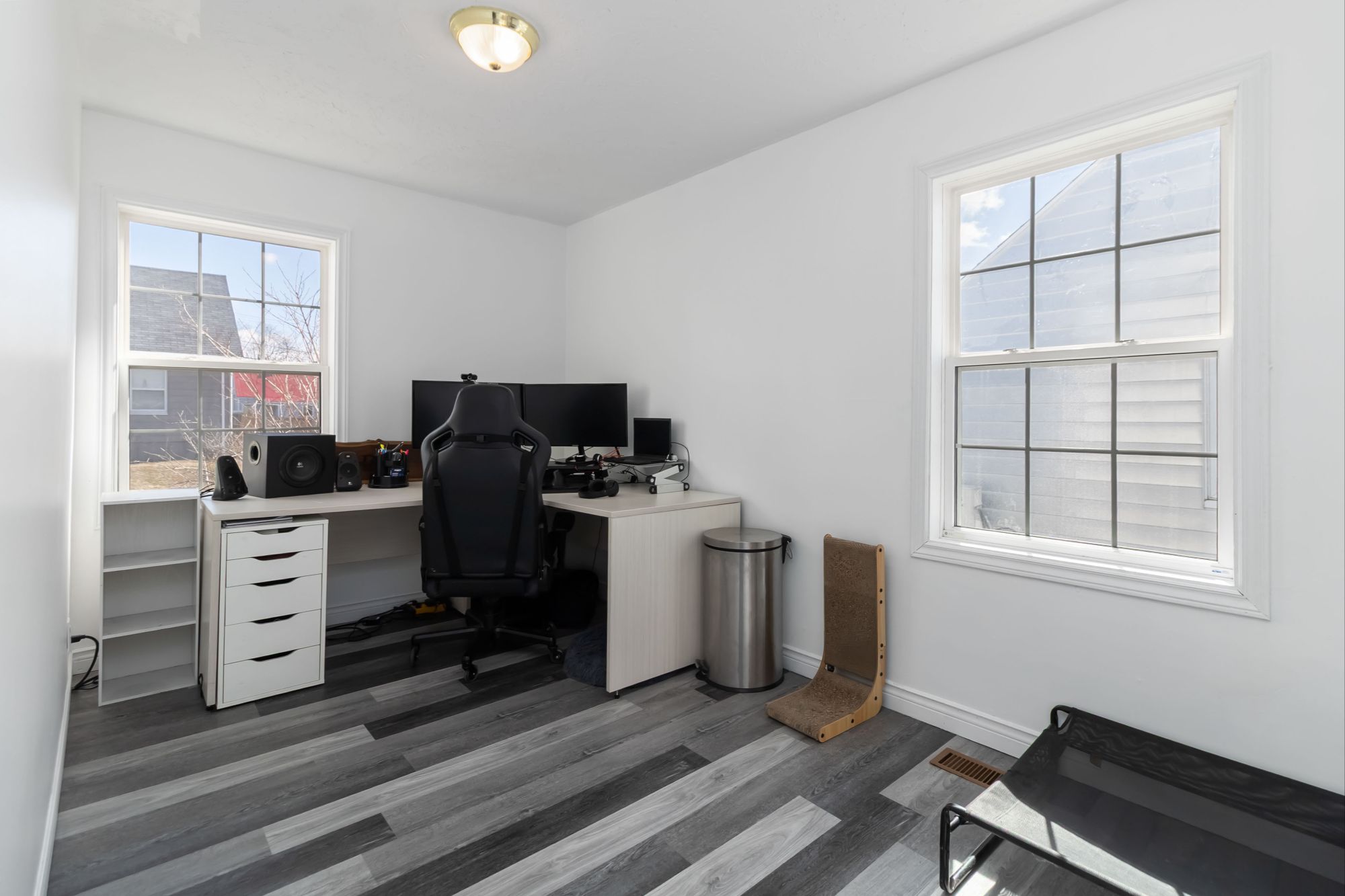 Versatile back room, currently used as a home office. Functions equally well as a bedroom