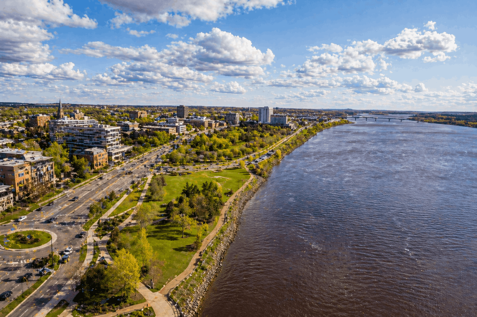 Aerial view of Moncton Petitcodiac riverfront and Assomption Boulevard showing downtown development corridor in 2026