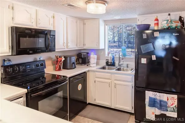 74 Eleven West CT #2C, Sunrise Beach, MO 65079