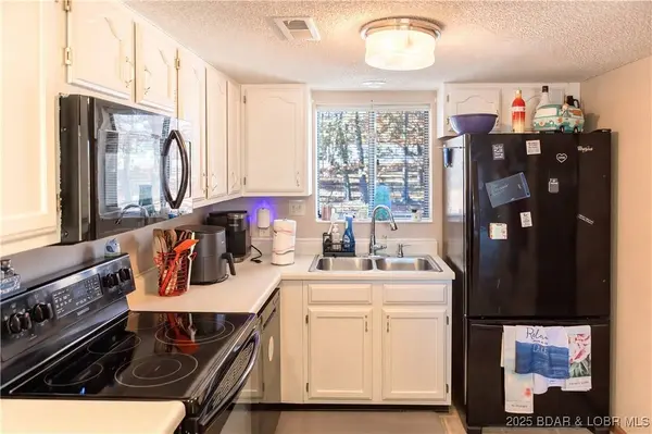 74 Eleven West CT #2C, Sunrise Beach, MO 65079