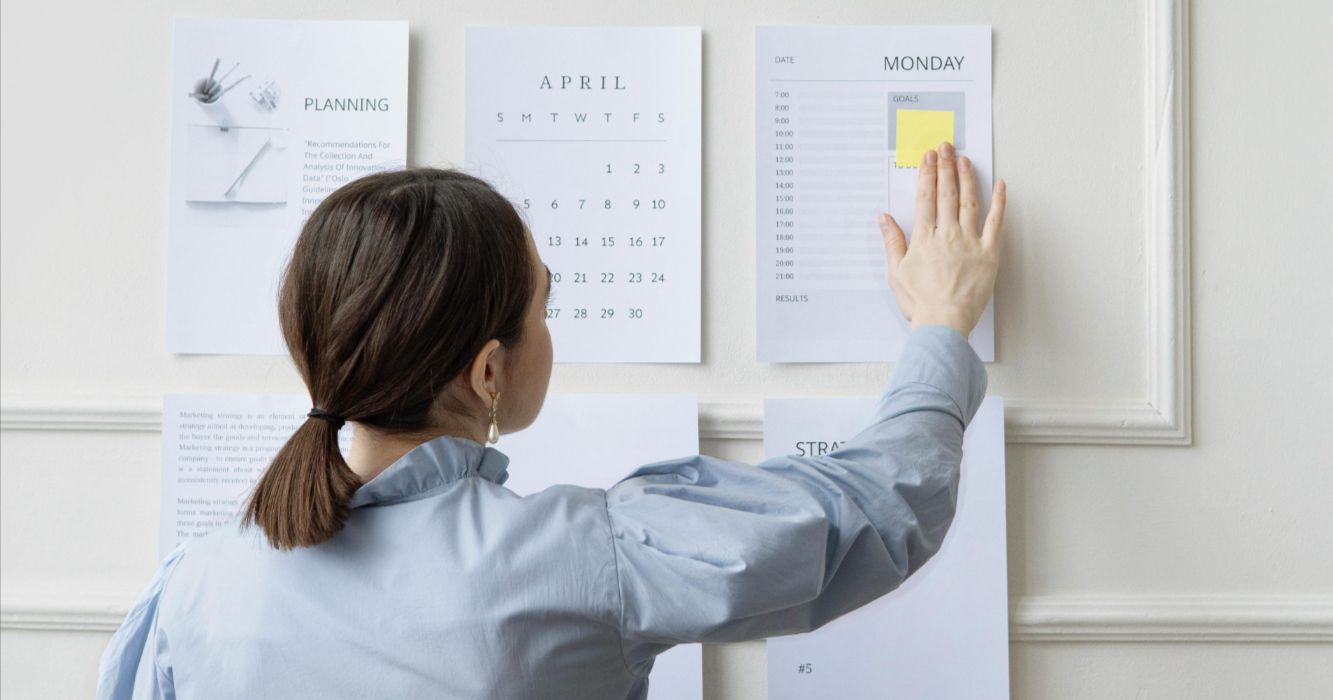 Houston listing agent at a modern desk with a clean timeline dashboard on a laptop; warm daylight; premium editorial look.