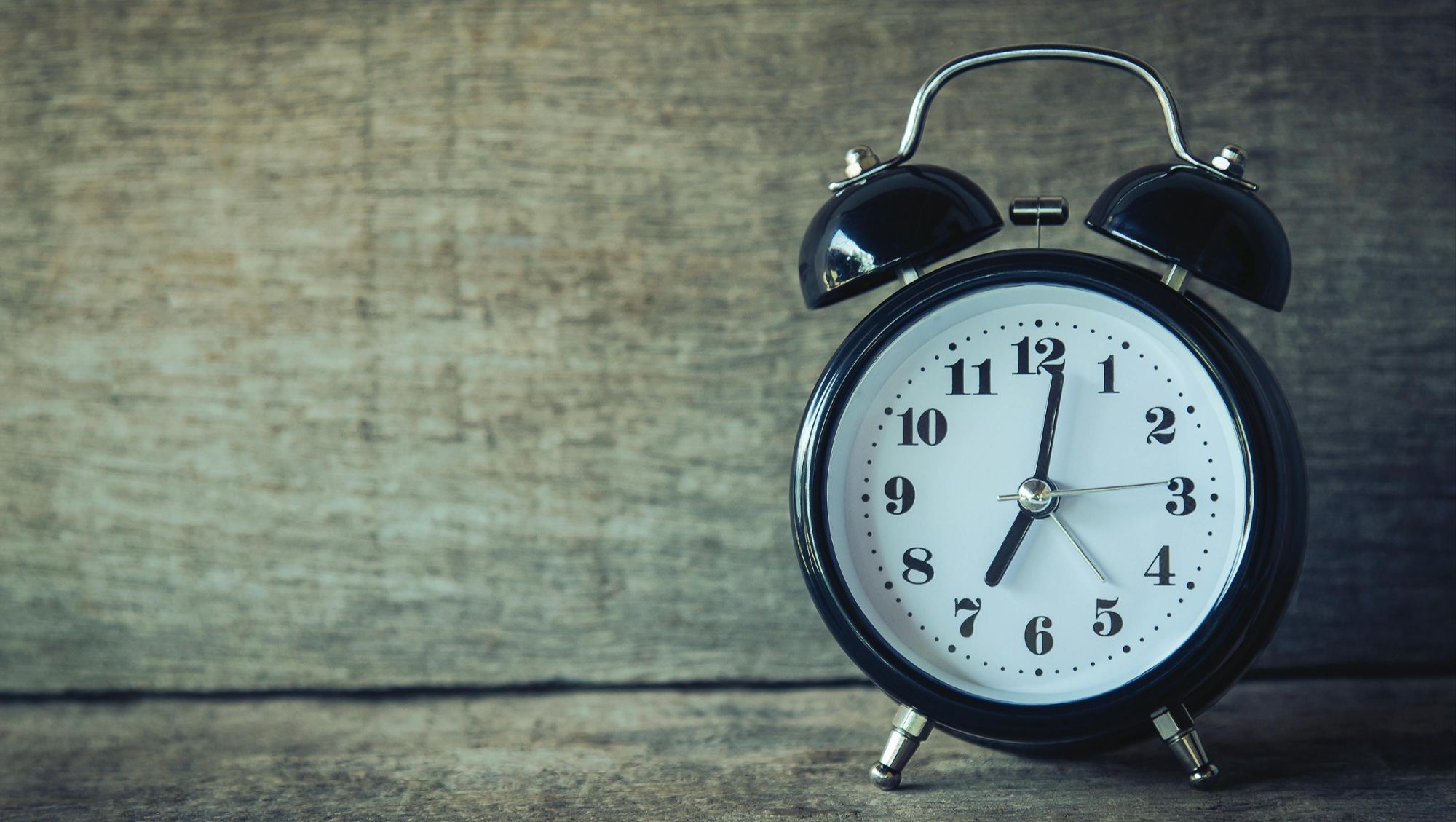 Texas Realtor reviewing a weekly pipeline plan on a laptop; focus on productivity and time-saving systems