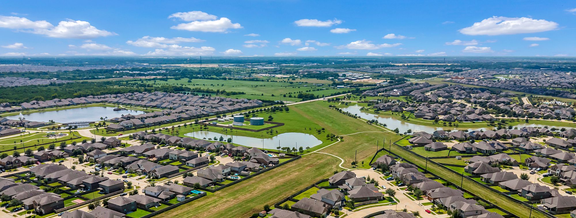 Houston skyline and neighborhoods at golden hour in fall, symbolizing contract timelines and market momentum