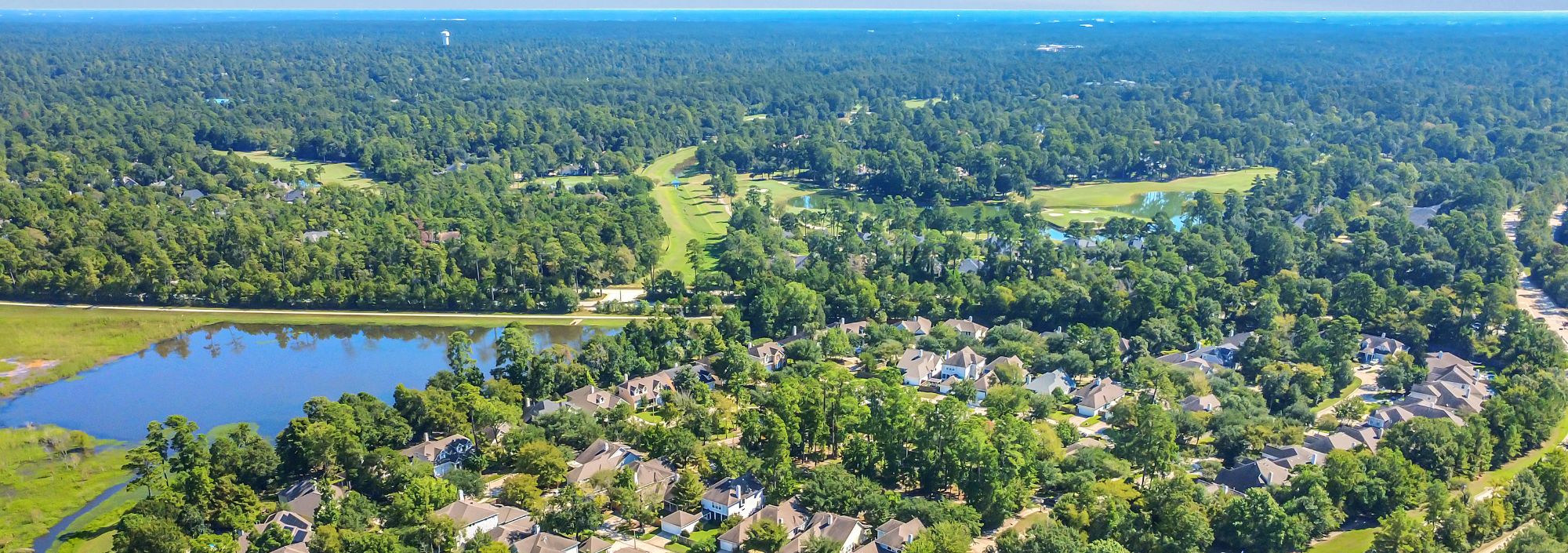 Golden-hour aerial over Cypress and Katy master-planned communities