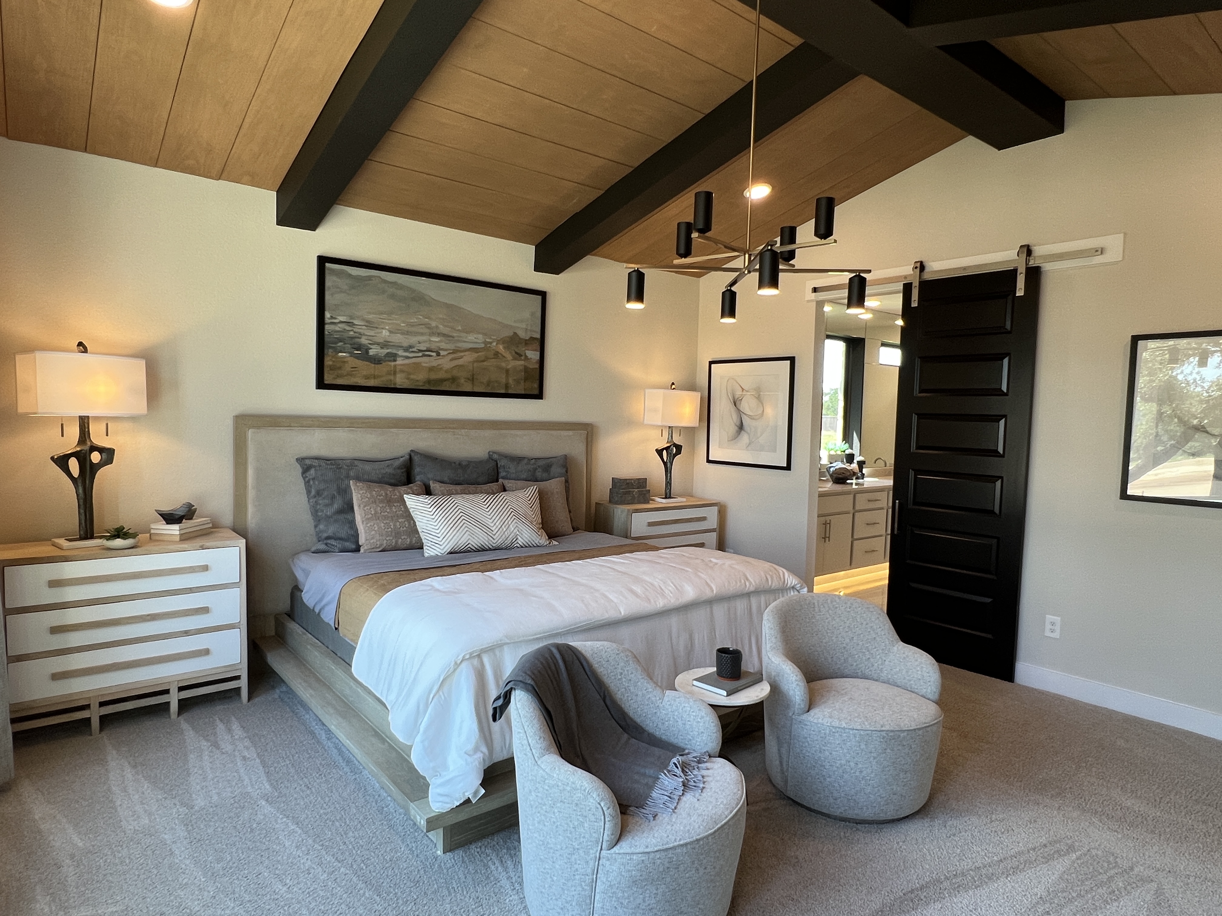 Primary bedroom in Riverstone model home Georgetown TX