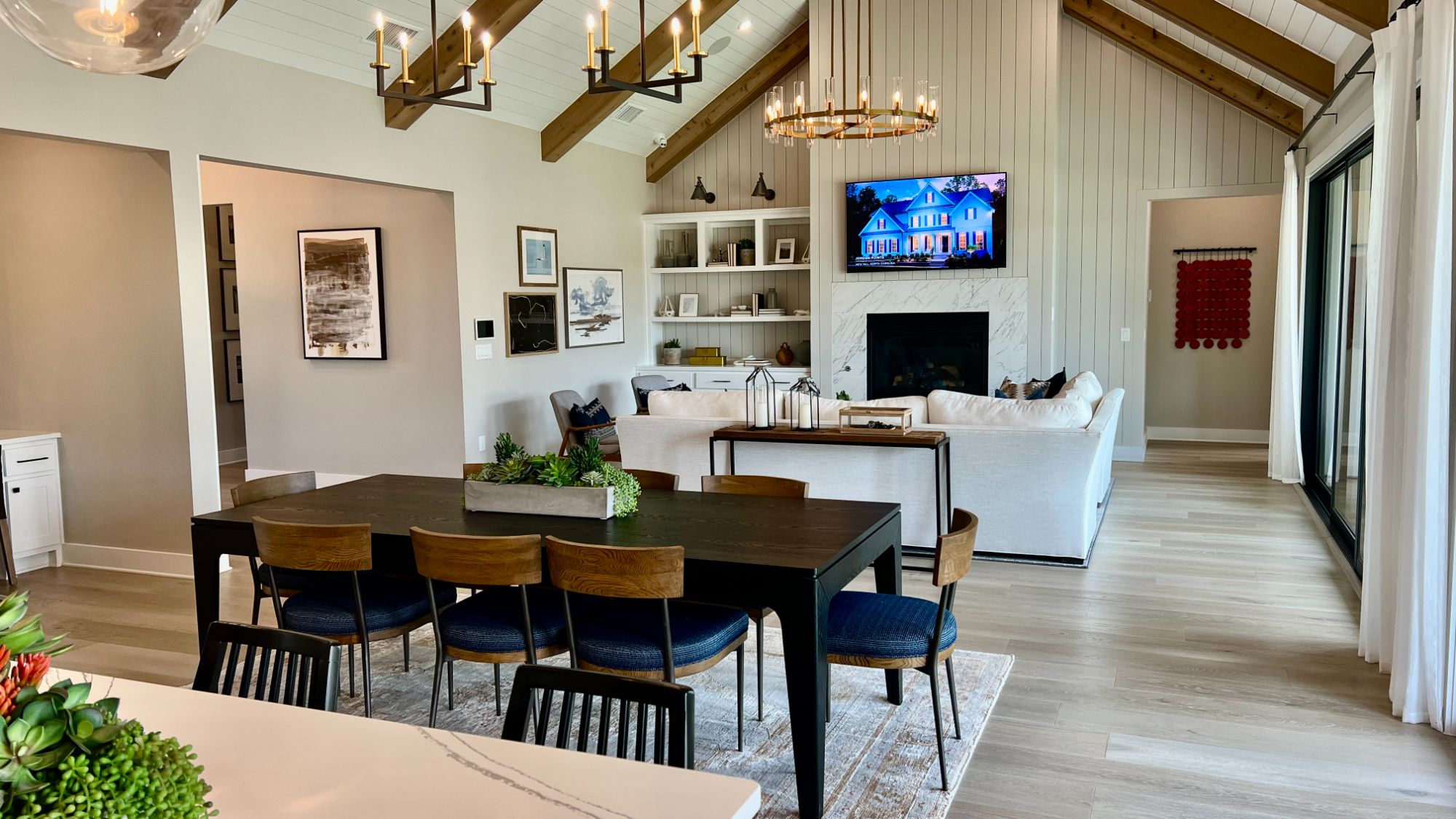 Open concept dining and living area inside the Blanton model home at Regency at Santa Rita Ranch in Liberty Hill Texas
