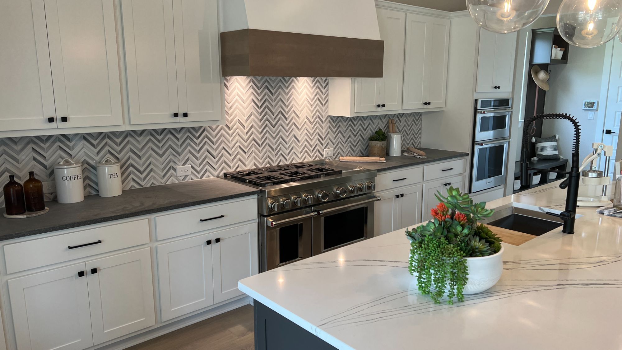 Kitchen inside the Blanton model home at Regency at Santa Rita Ranch in Liberty Hill Texas