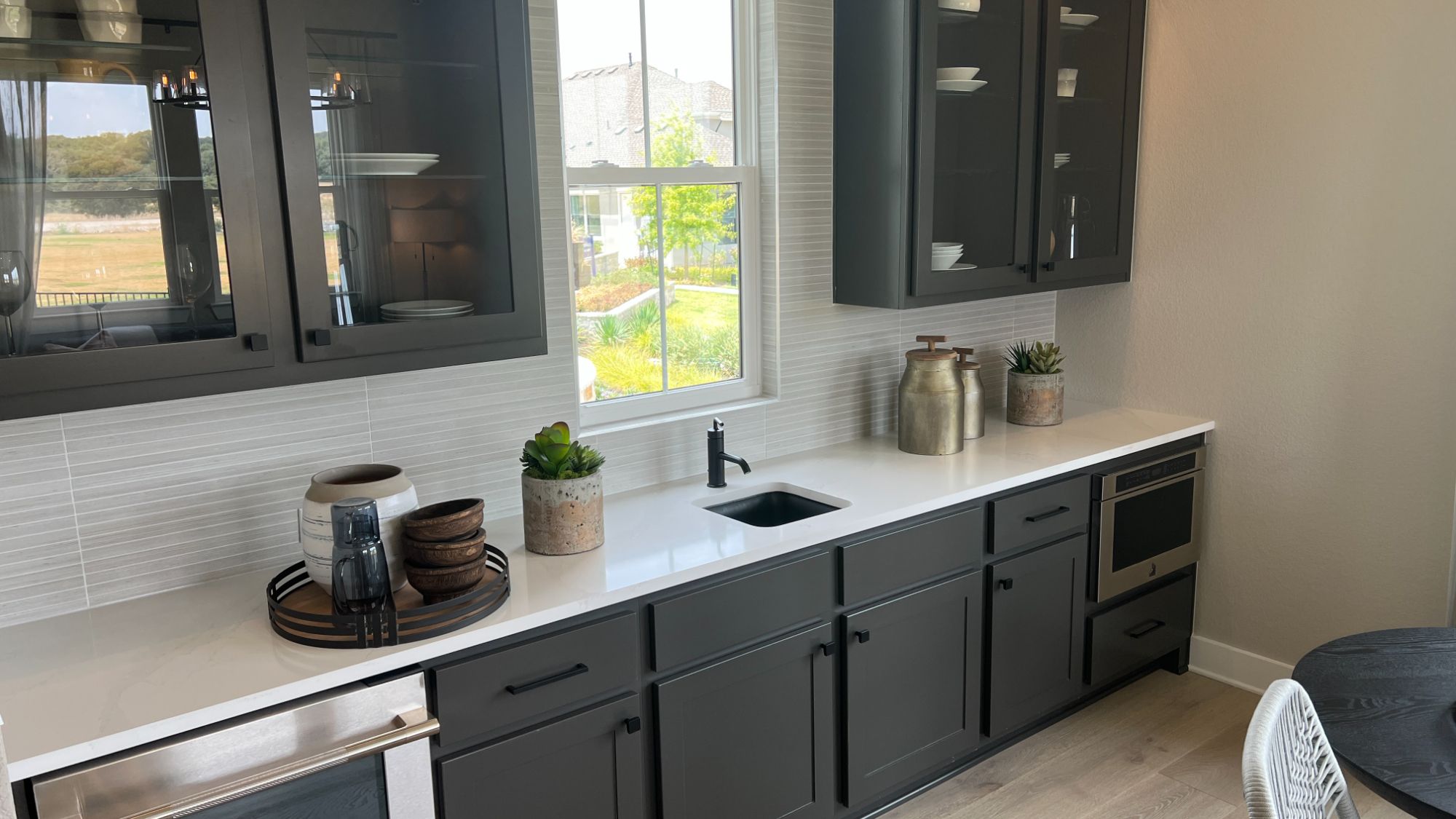 En suite kitchenette inside the Blanton model home at Regency at Santa Rita Ranch in Liberty Hill Texas