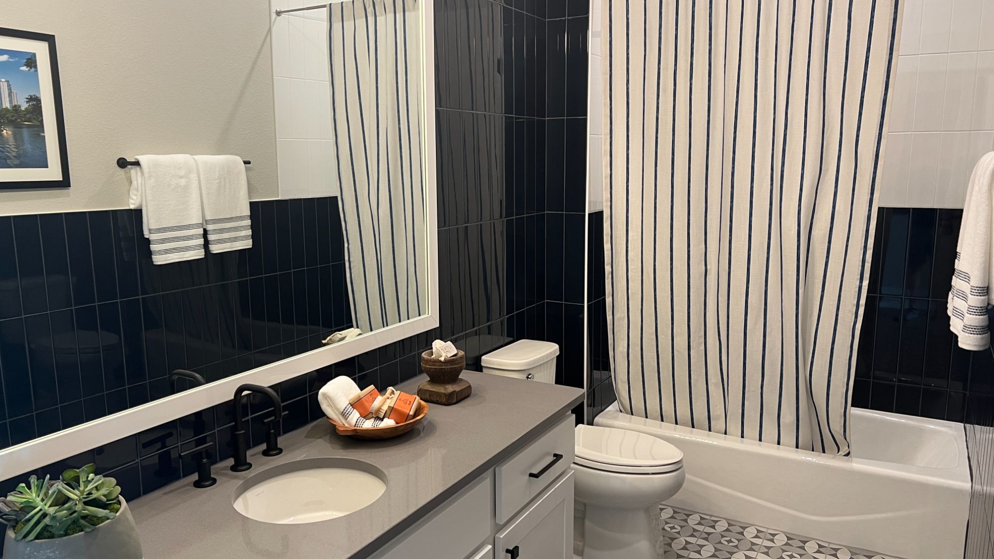 Secondary bathroom inside the Blanton model home at Regency at Santa Rita Ranch in Liberty Hill Texas