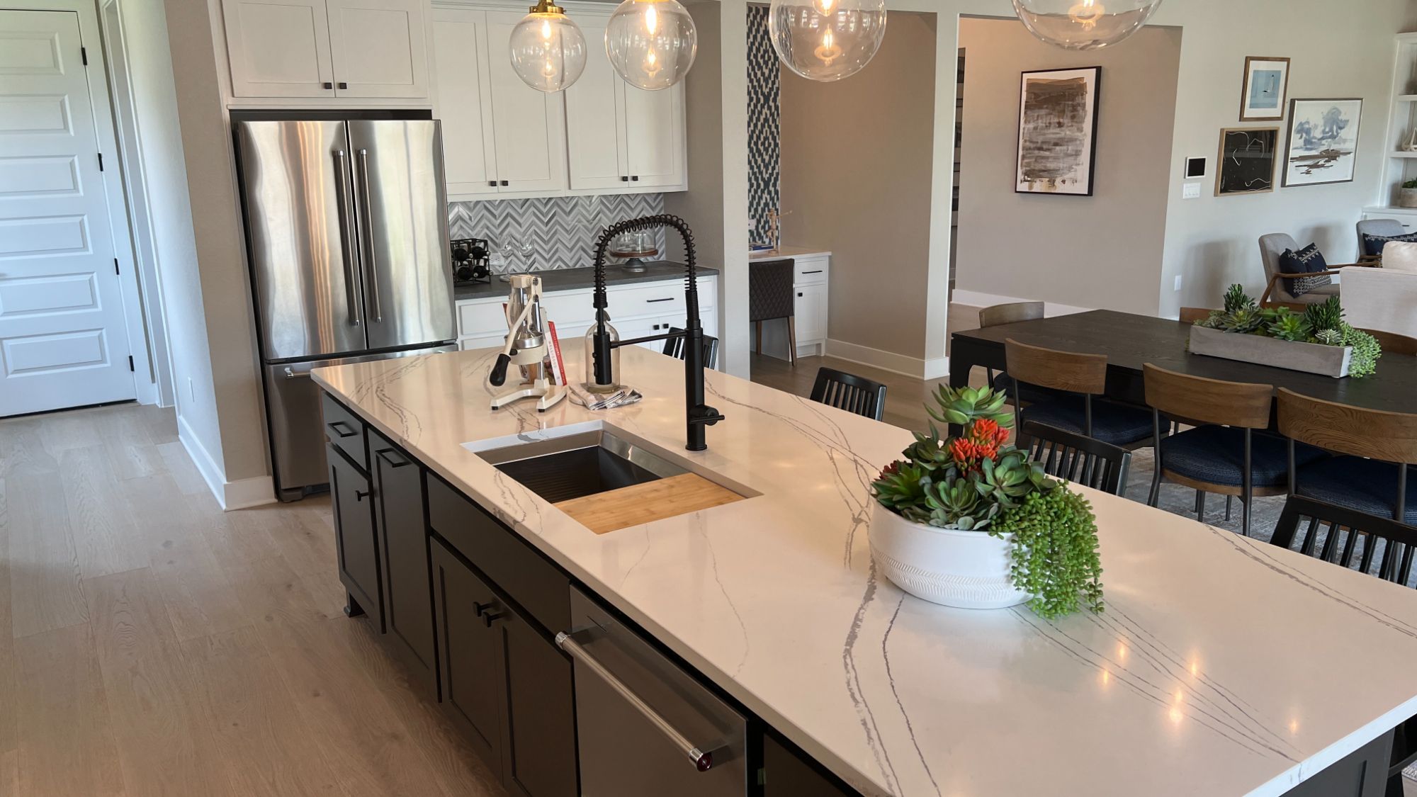 Kitchen island inside the Blanton model home at Regency at Santa Rita Ranch in Liberty Hill Texas