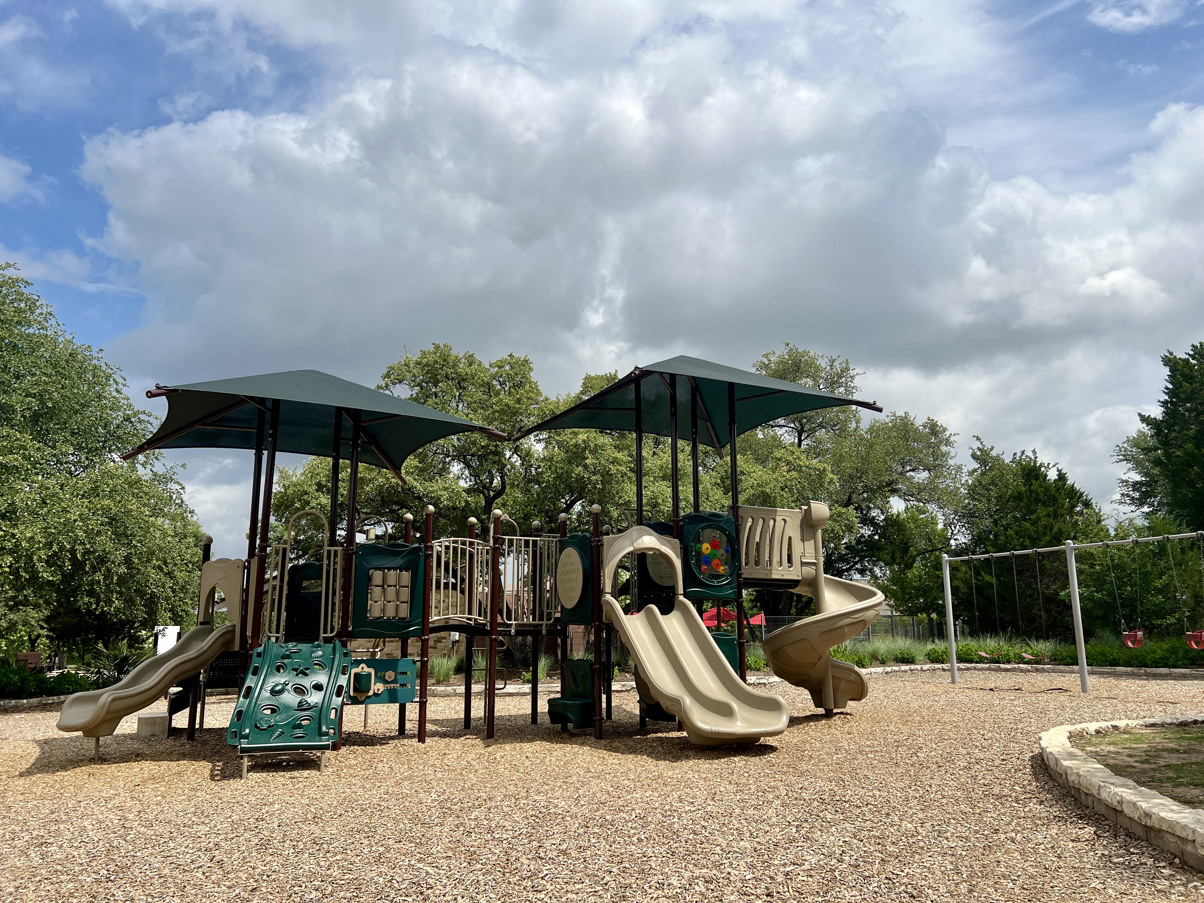 Playground at The Backyard amenity center in Bryson community in Leander Texas