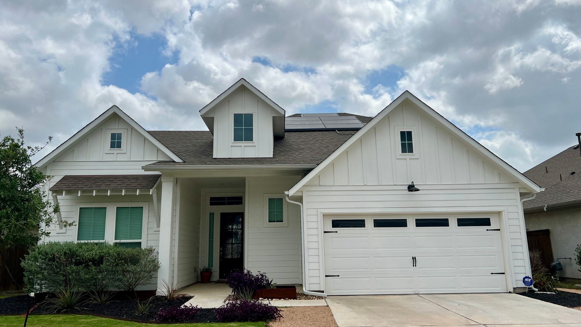 Single-family home in Bryson Leander TX with modern exterior design and front yard landscaping