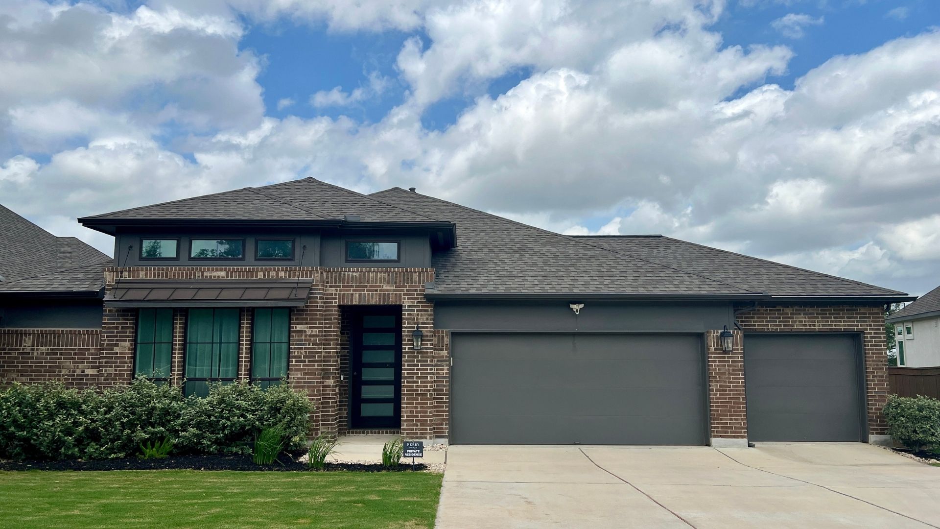 Bryson master-planned community home in Leander TX with brick accents and front-entry garage