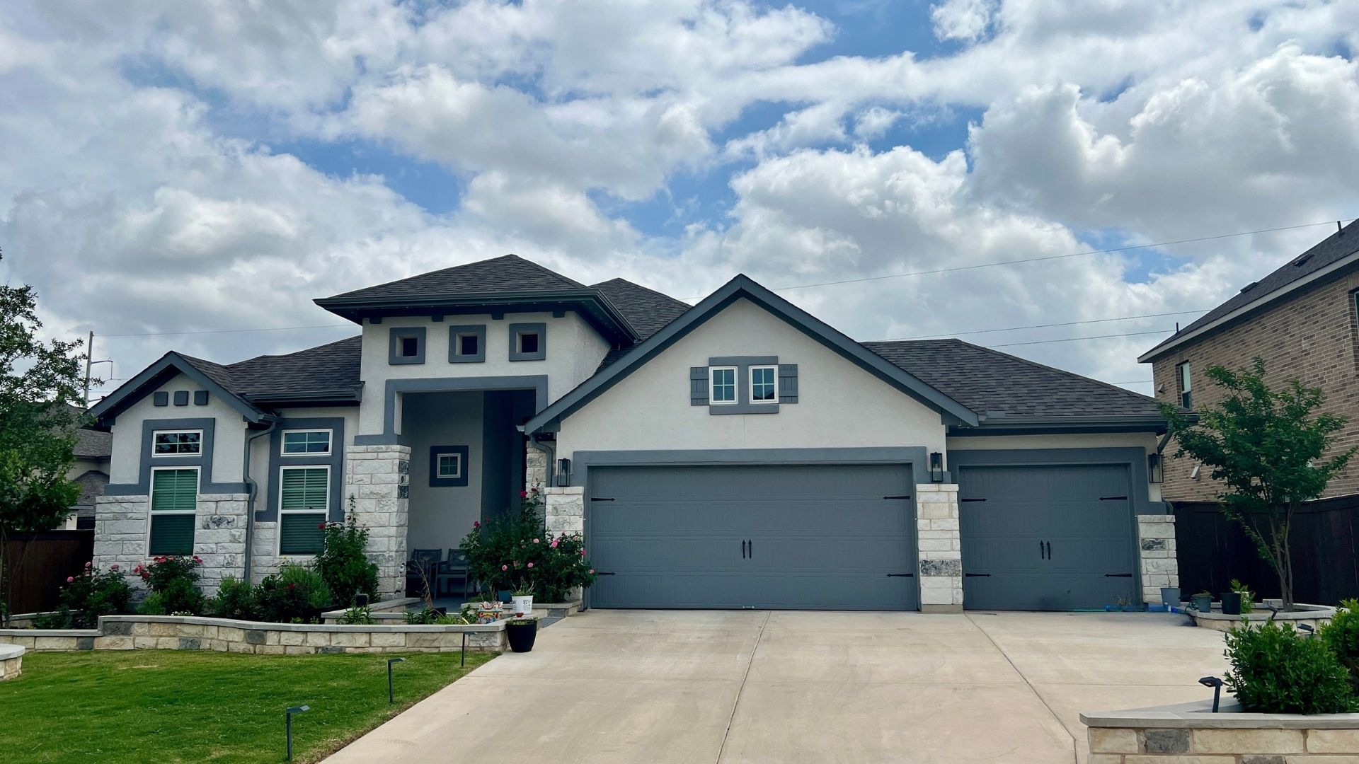 Residential street in the Bryson master-planned community in Leander TX with newer homes