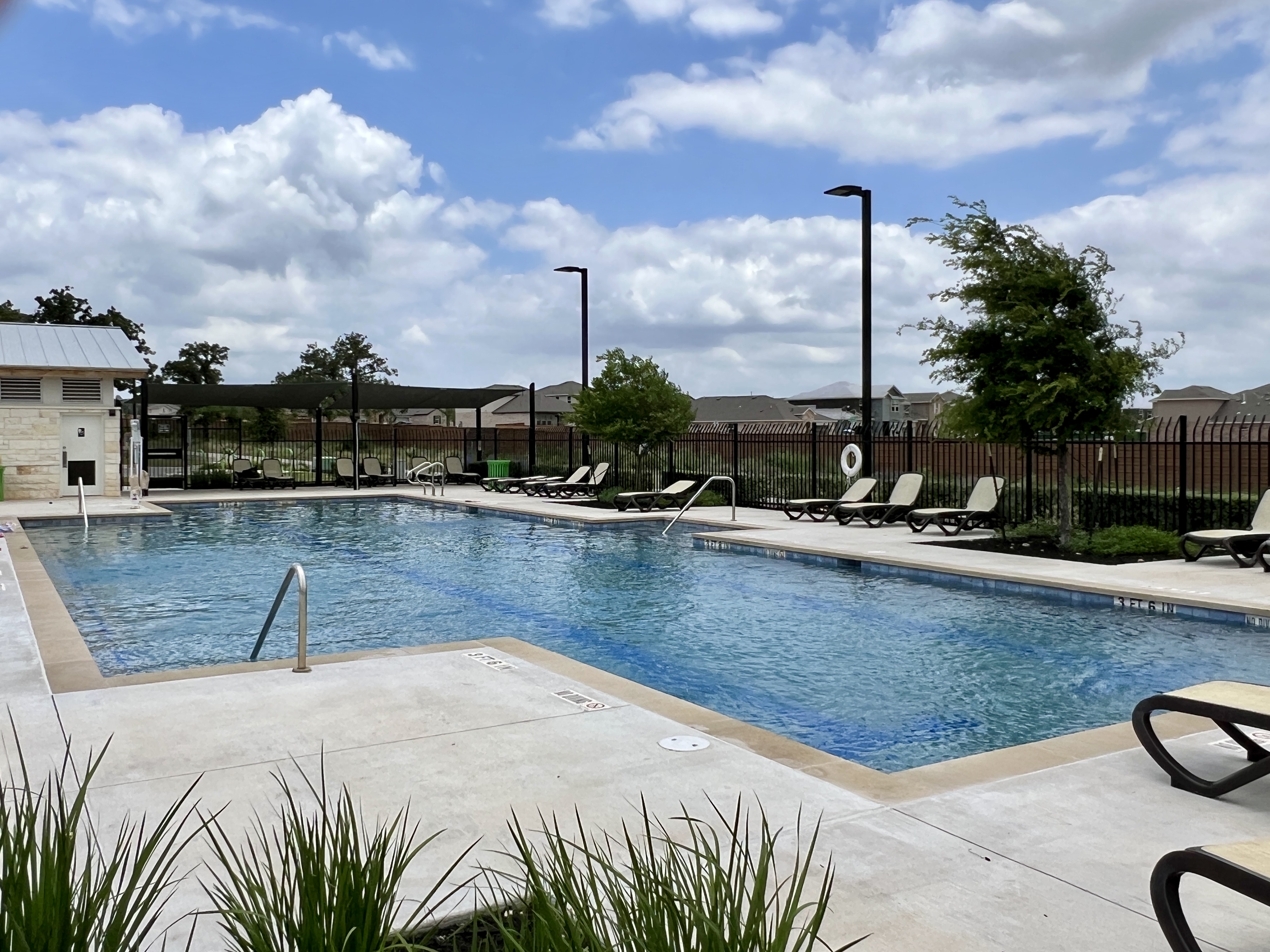 Smaller community pool at Larkspur in Leander TX, one of the neighborhood amenities available to residents in this master-planned community