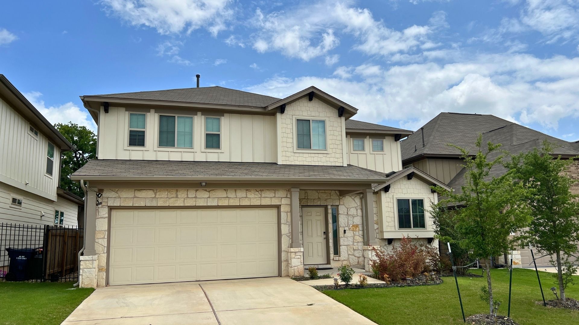 Home exterior in Larkspur Leander Texas showing suburban home styles in the neighborhood