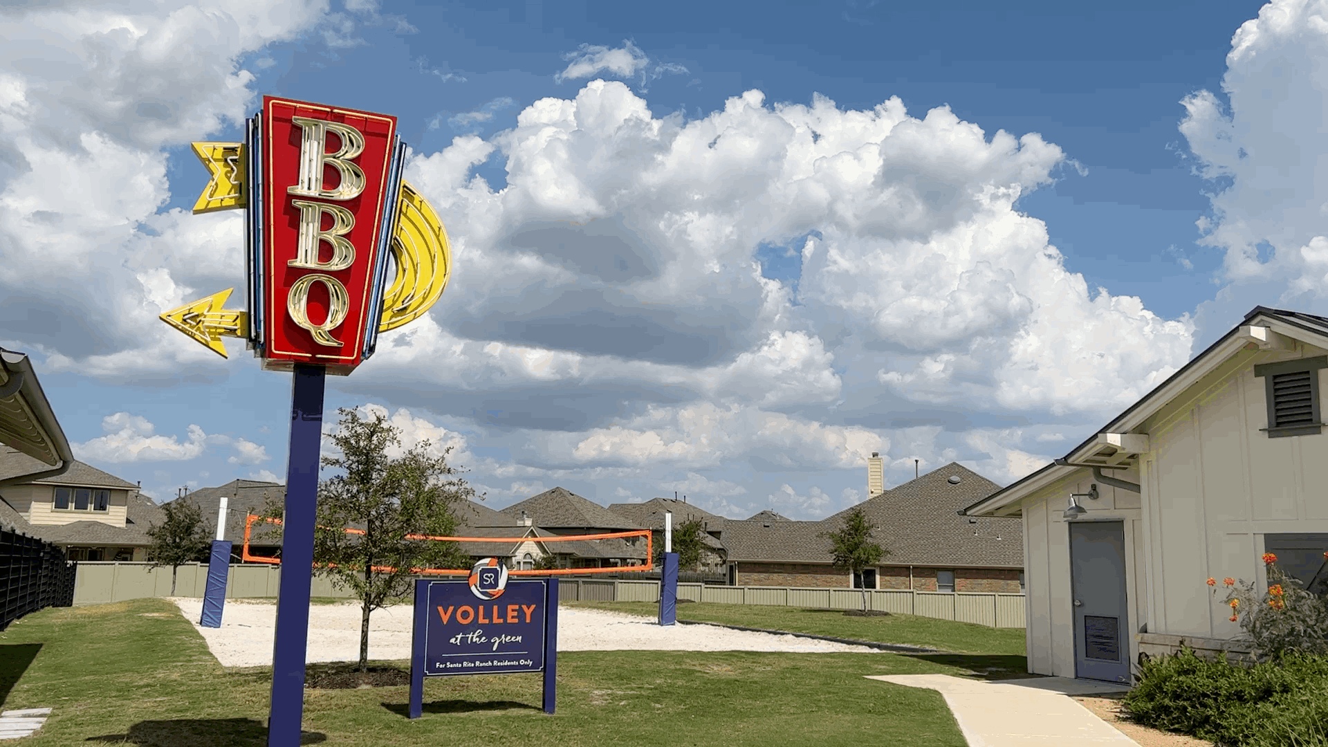 Outdoor BBQ area and sand volleyball court in Santa Rita Ranch Liberty Hill Texas