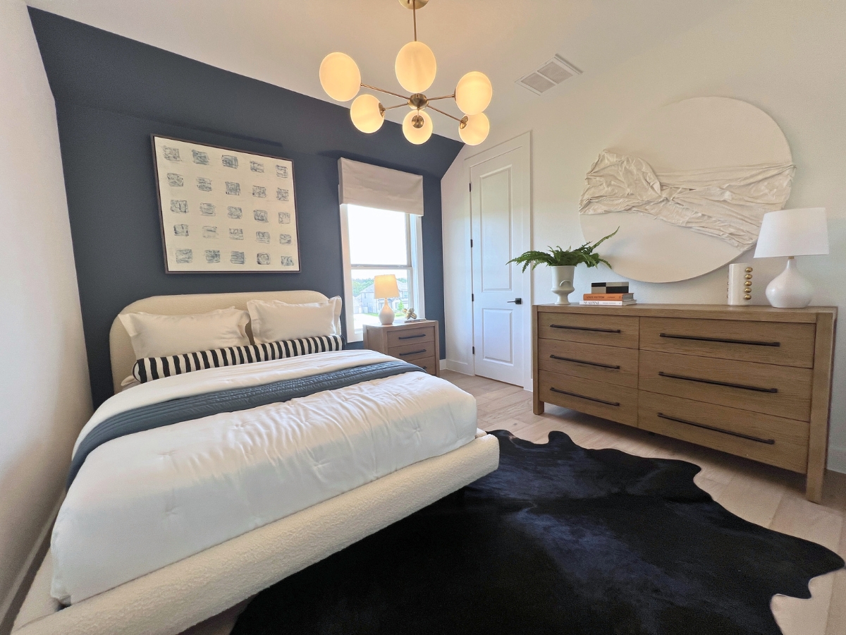 Upstairs secondary bedroom in Pulte home at Saddleback Santa Rita Ranch Liberty Hill Texas