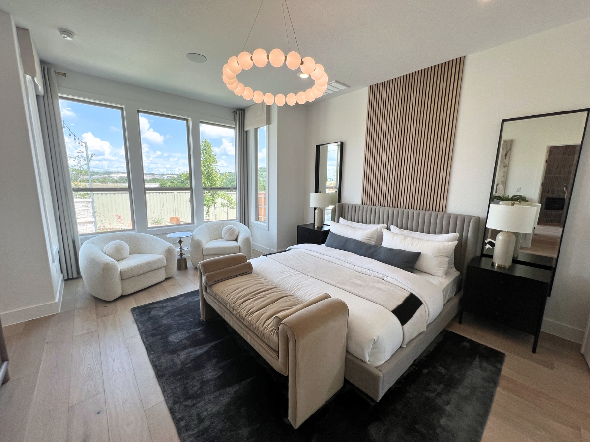 Pulte primary bedroom suite in Saddleback at Santa Rita Ranch Liberty Hill Texas