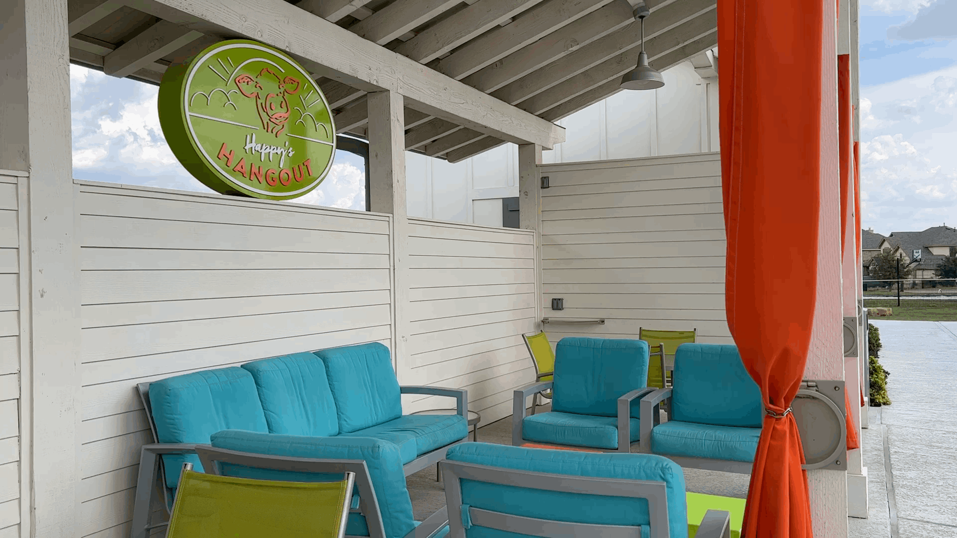 Poolside lounge seating at The Hub in Santa Rita Ranch Liberty Hill Texas
