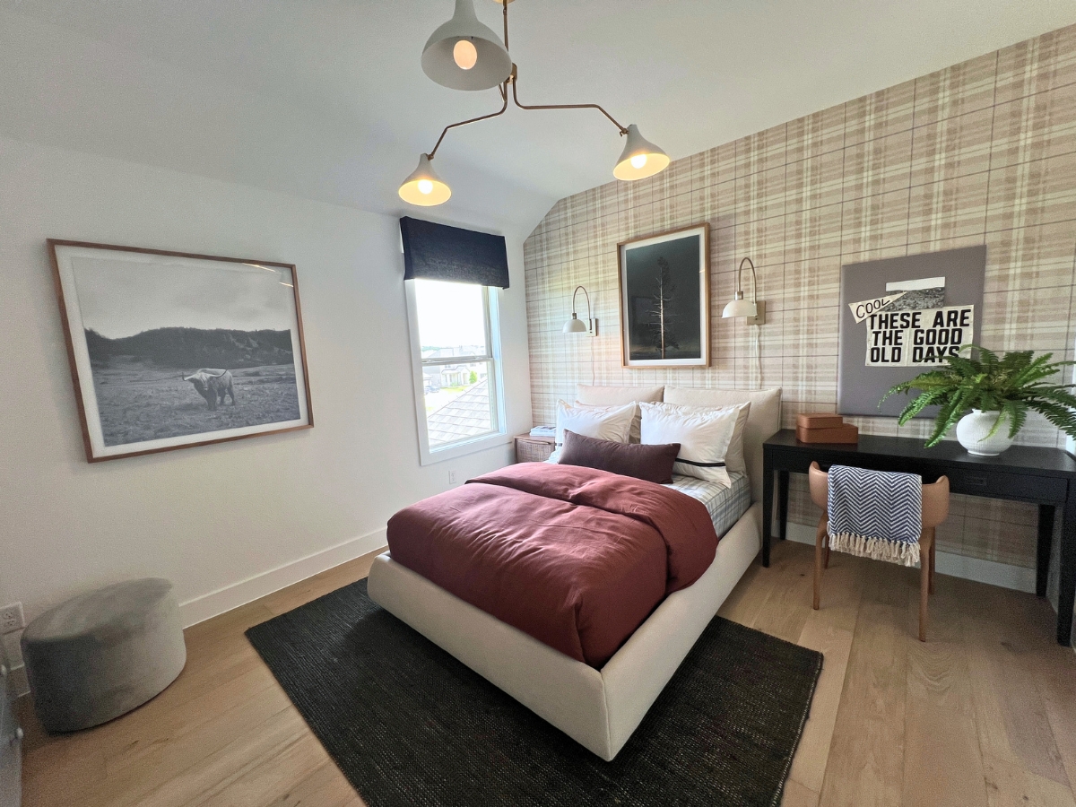 Upstairs bedroom with natural light in Pulte home at Saddleback Santa Rita Ranch Liberty Hill Texas