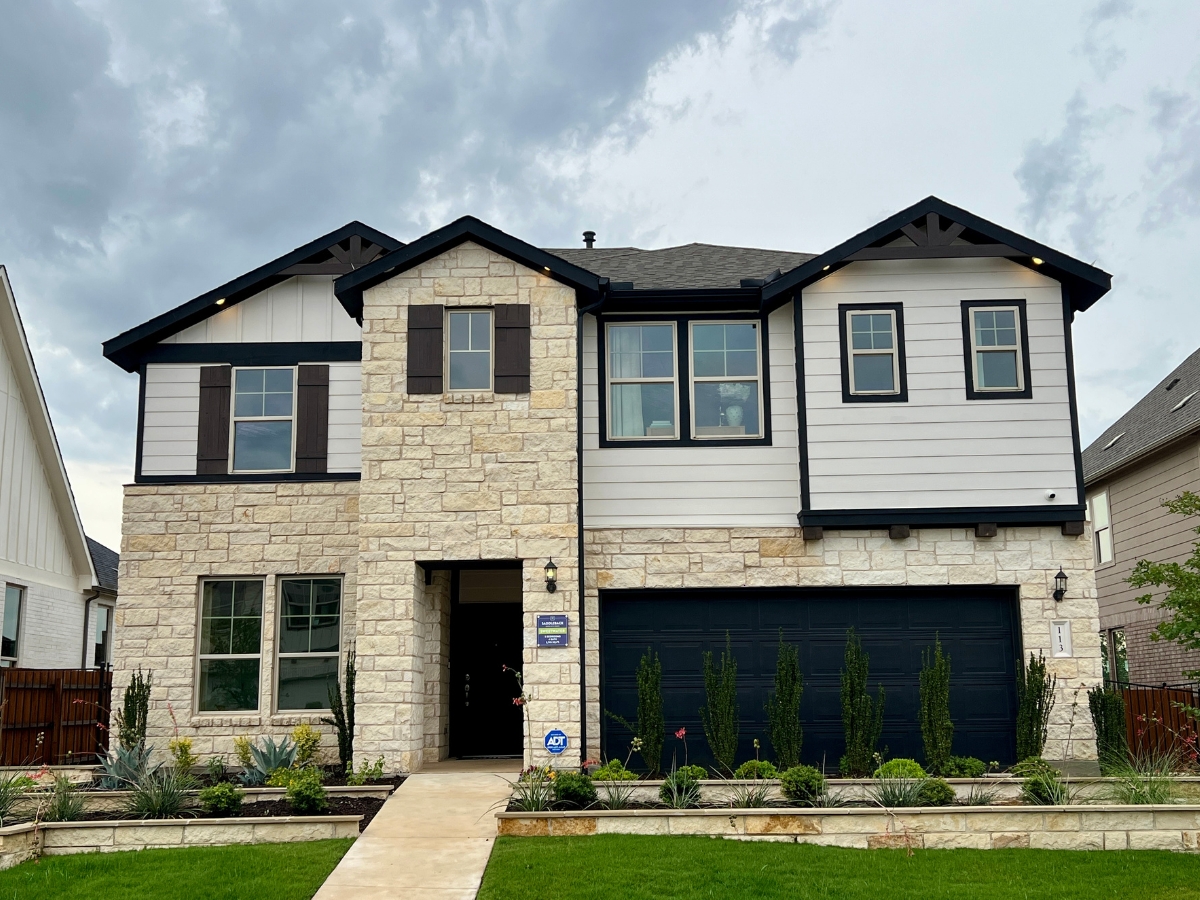 Two-story Pulte model home in Saddleback at Santa Rita Ranch Liberty Hill Texas