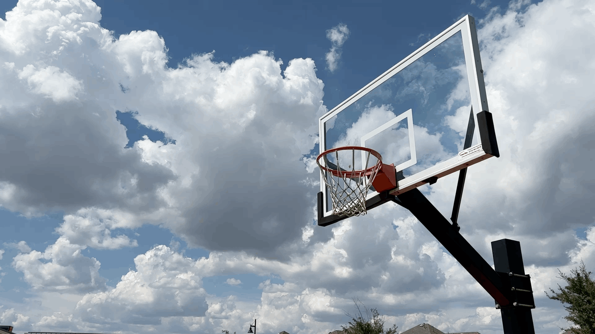 Basketball hoop and outdoor sports court in Santa Rita Ranch Liberty Hill Texas