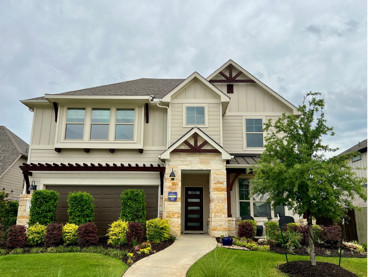 Pulte model home exterior in Saddleback at Santa Rita Ranch Liberty Hill Texas