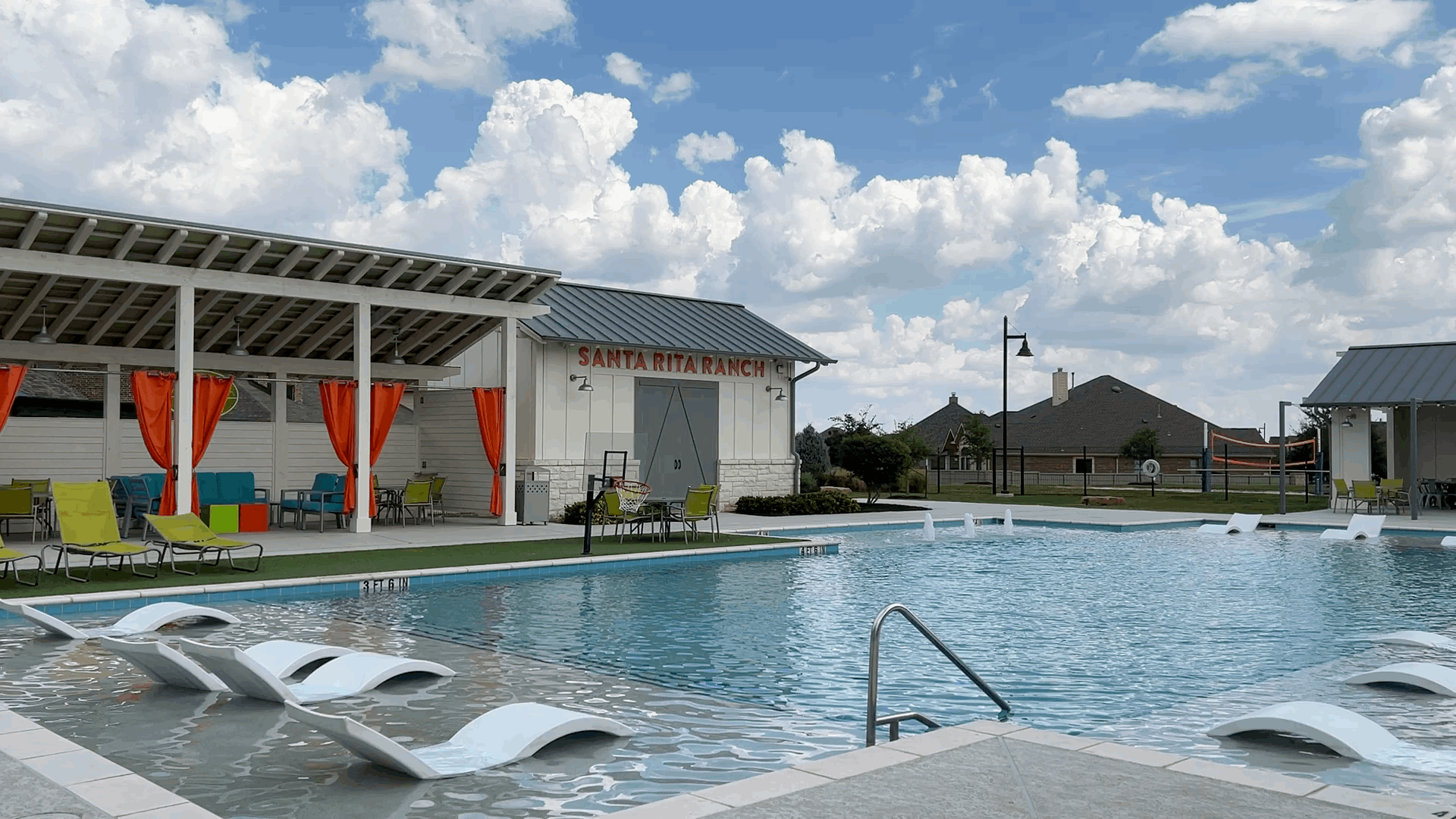 Resort-style pool and lounge area at The Hub in Santa Rita Ranch Liberty Hill Texas