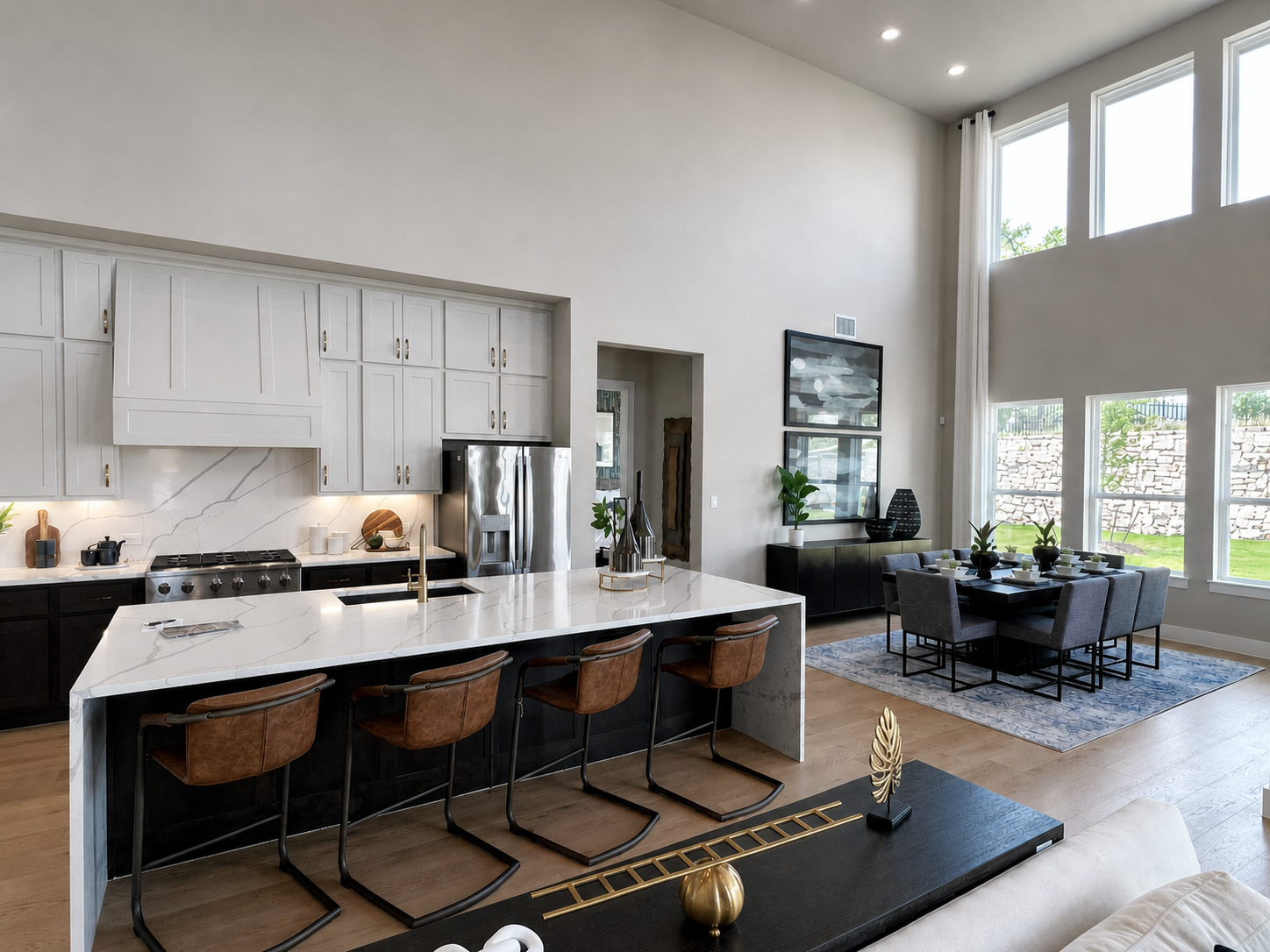 Open concept living room in The Heights at San Gabriel home in Georgetown, Texas