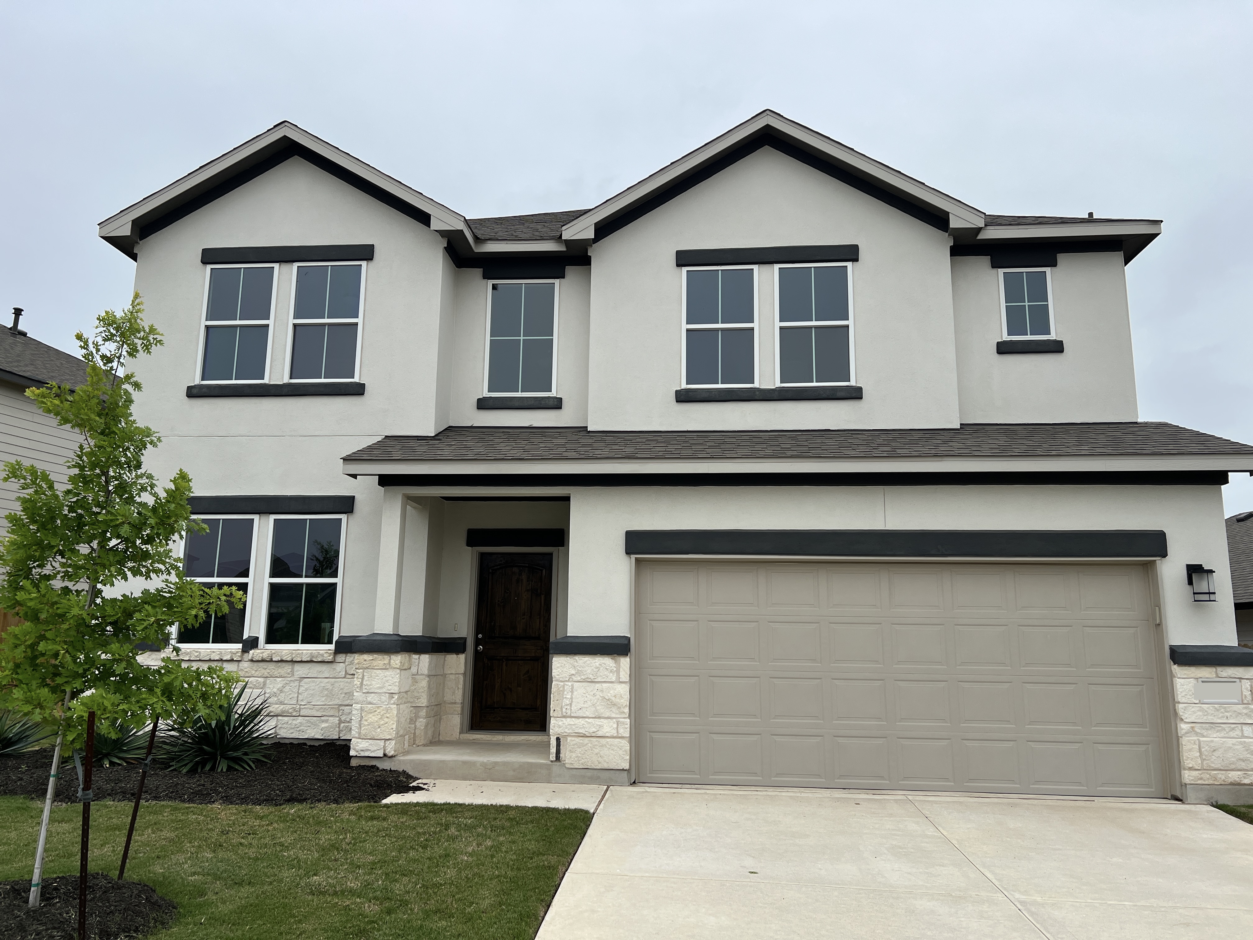 Stucco home in Morningstar neighborhood in Georgetown, Texas