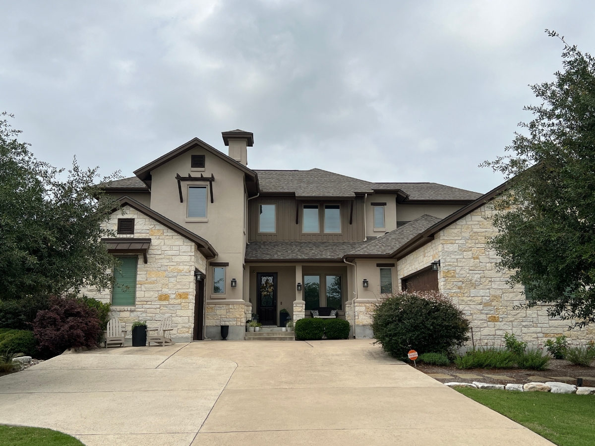 Stone and stucco home in Reagan's Overlook neighborhood in Leander Texas