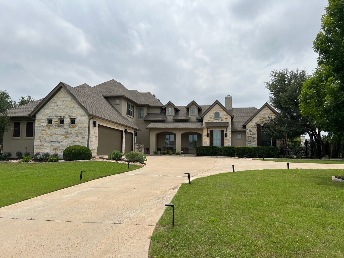 Large lot home in Reagan's Overlook Leander Texas with Hill Country style exterior