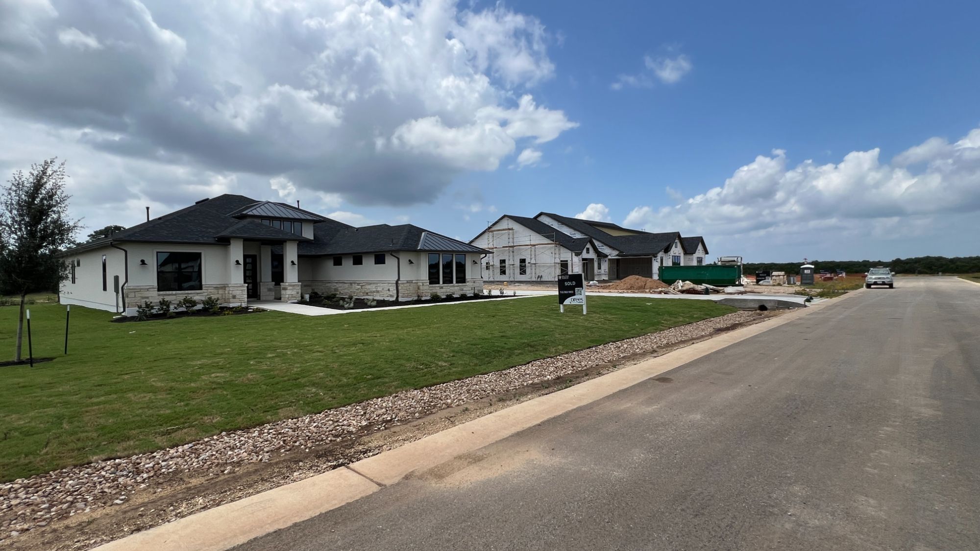 New luxury homes under construction in Hilltop Ranch, an acre-lot community in Leander, Texas