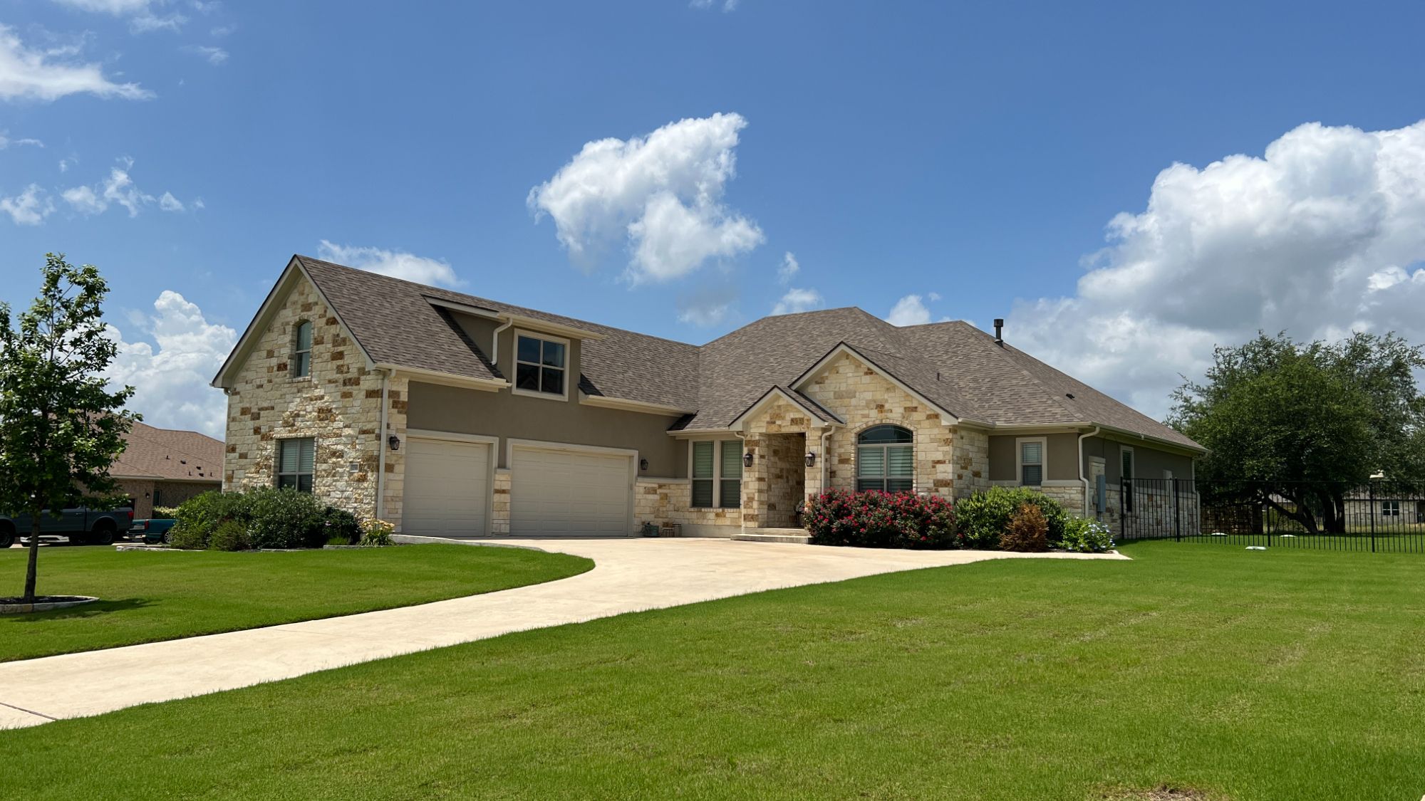 Greatwood home on a one-acre homesite with mature landscaping in Leander, Texas