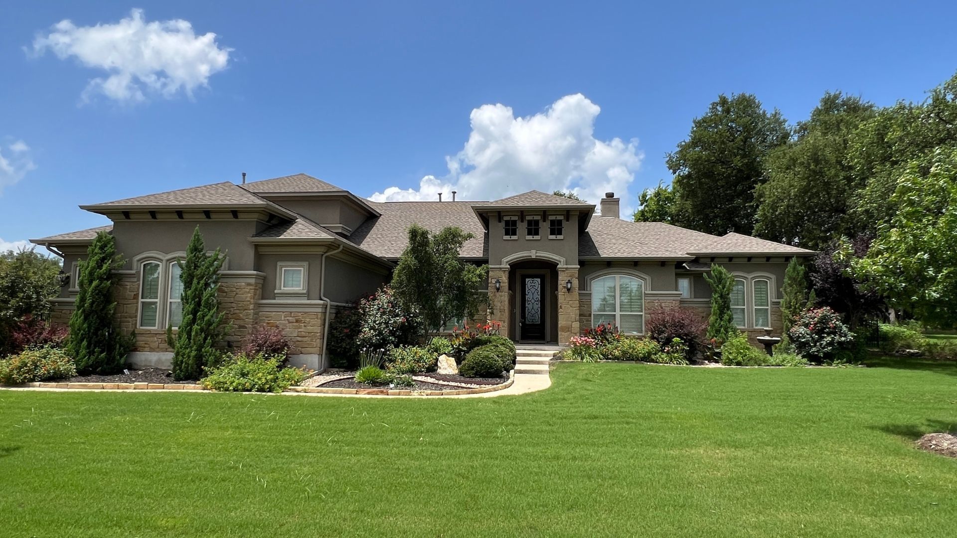 Greatwood home in Leander Texas with mature landscaping and one-acre homesite