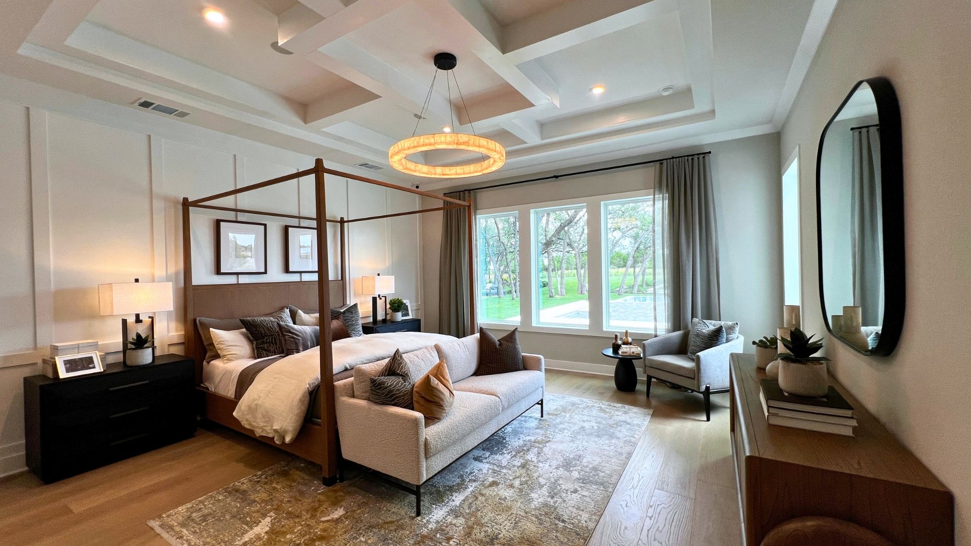 Primary bedroom suite in the Toll Brothers Bell Springs model home at Woodland Estates in Leander, Texas