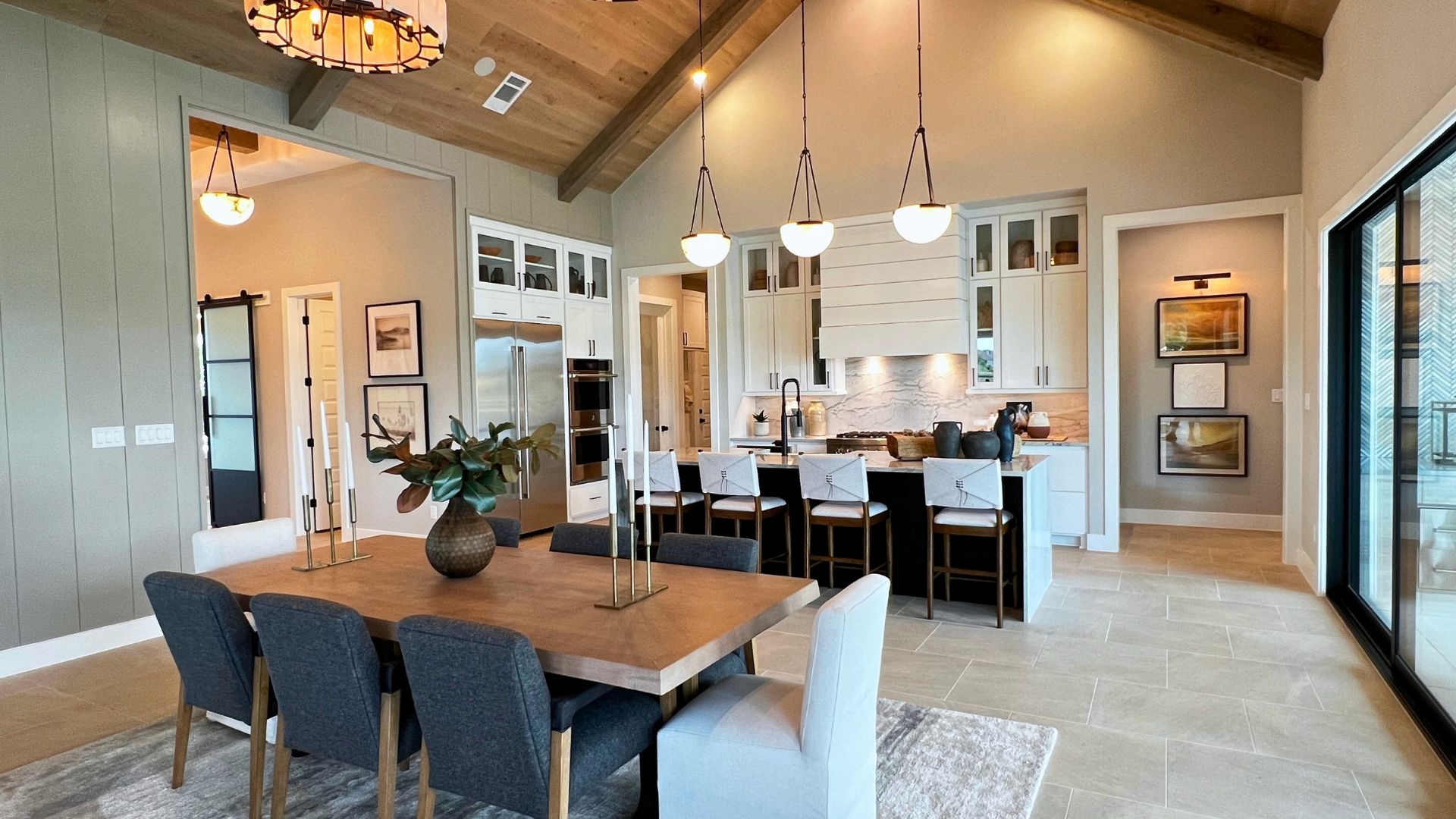 Cathedral ceiling open-concept dining room and kitchen in the Toll Brothers Bell Springs model home at Woodland Estates