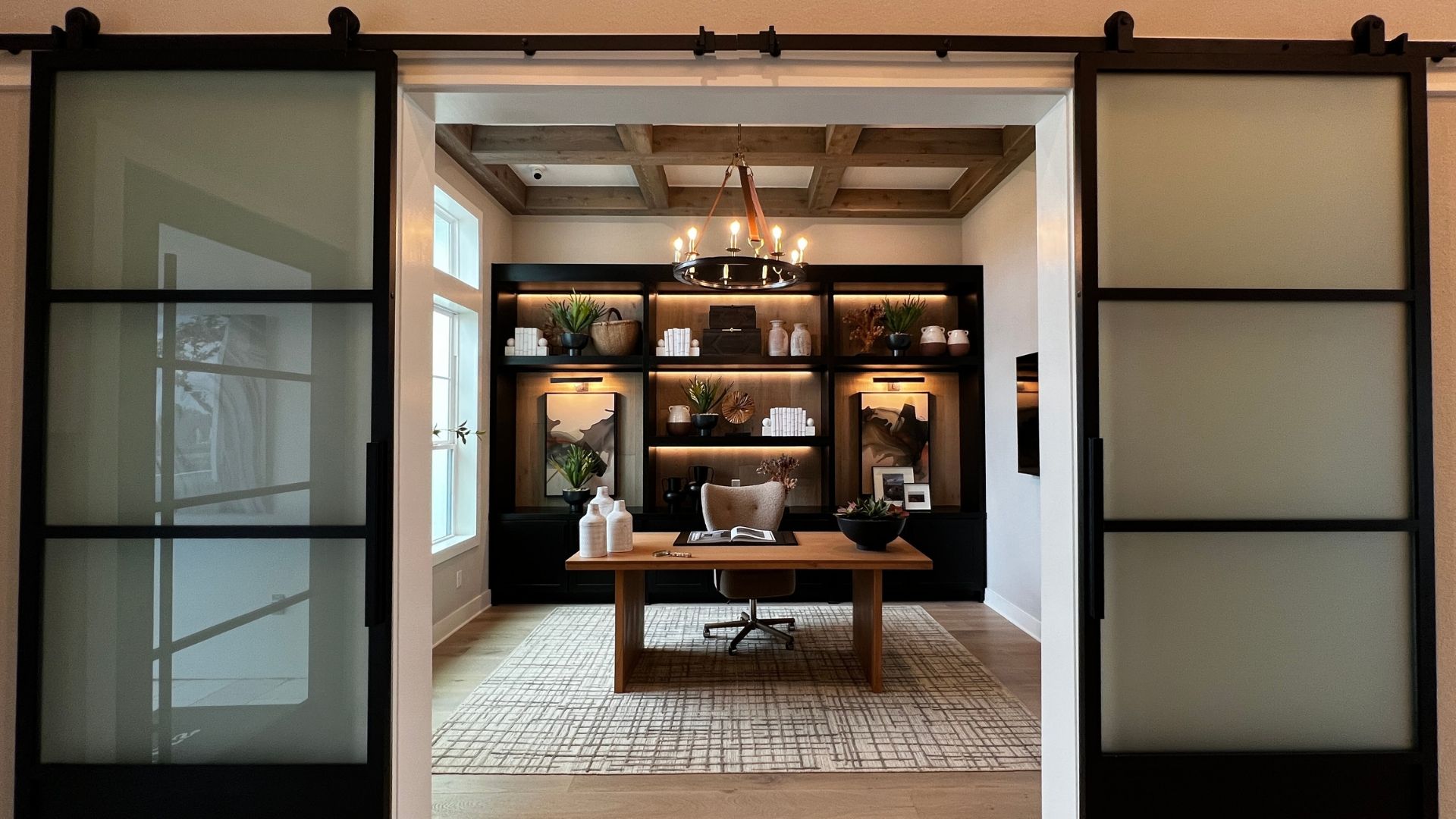 Private home office in the Bell Springs model home at Woodland Estates in Leander