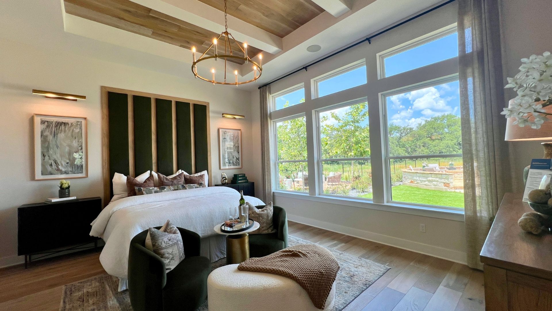 Primary bedroom suite inside the David Weekley Monterey model home at Leander Estates in Leander Texas