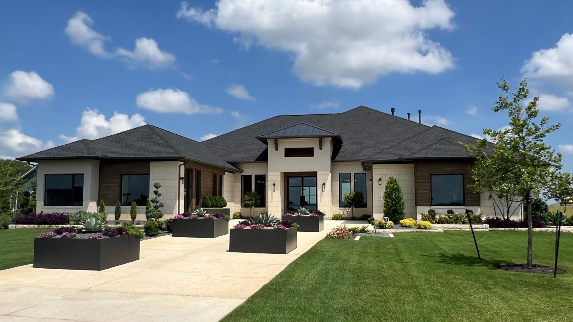 Scott Felder Bulverde model home with modern exterior at Leander Estates in Leander Texas