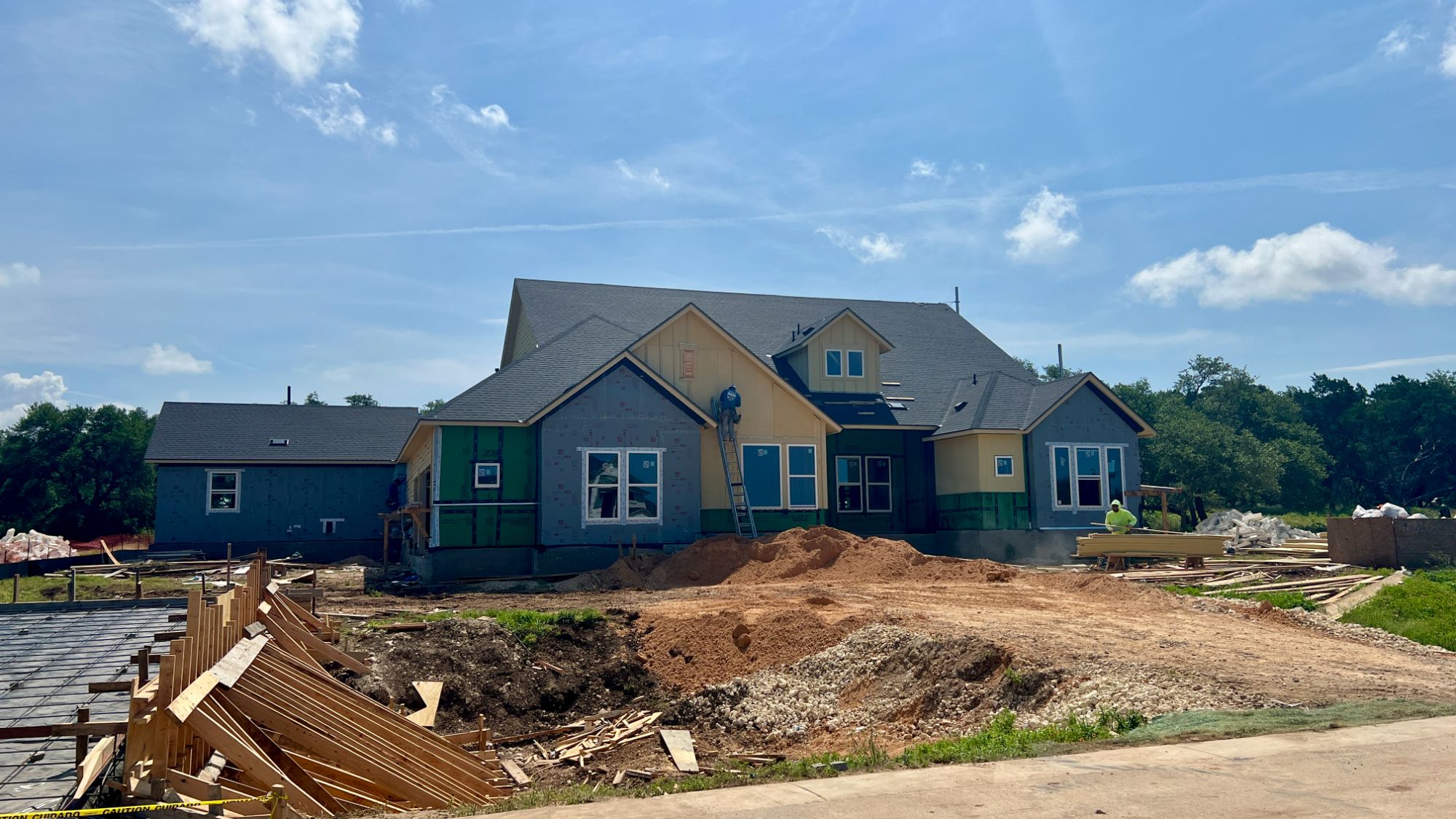 New home under construction in Leander Estates, a luxury one-acre homesite community in Leander Texas