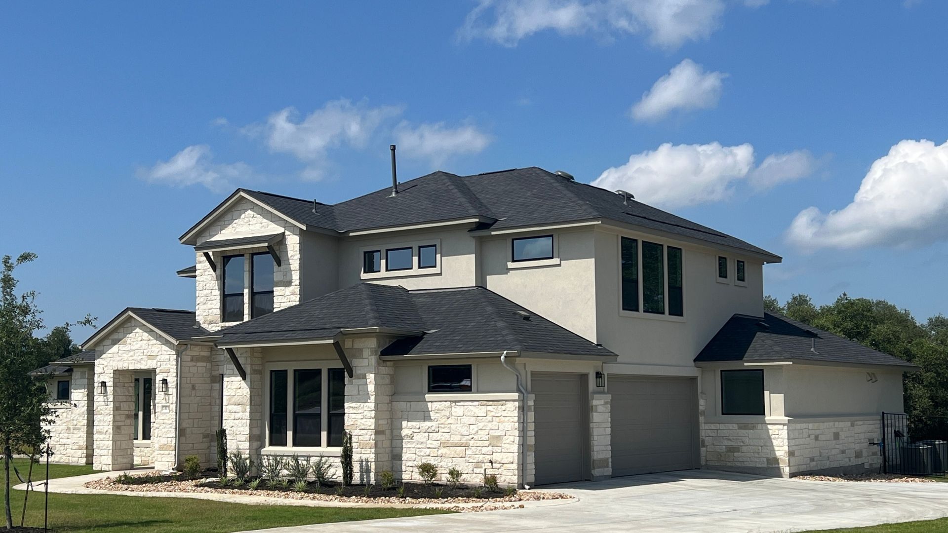 Two-story new construction home in Leander Estates, a luxury one-acre homesite community in Leander Texas