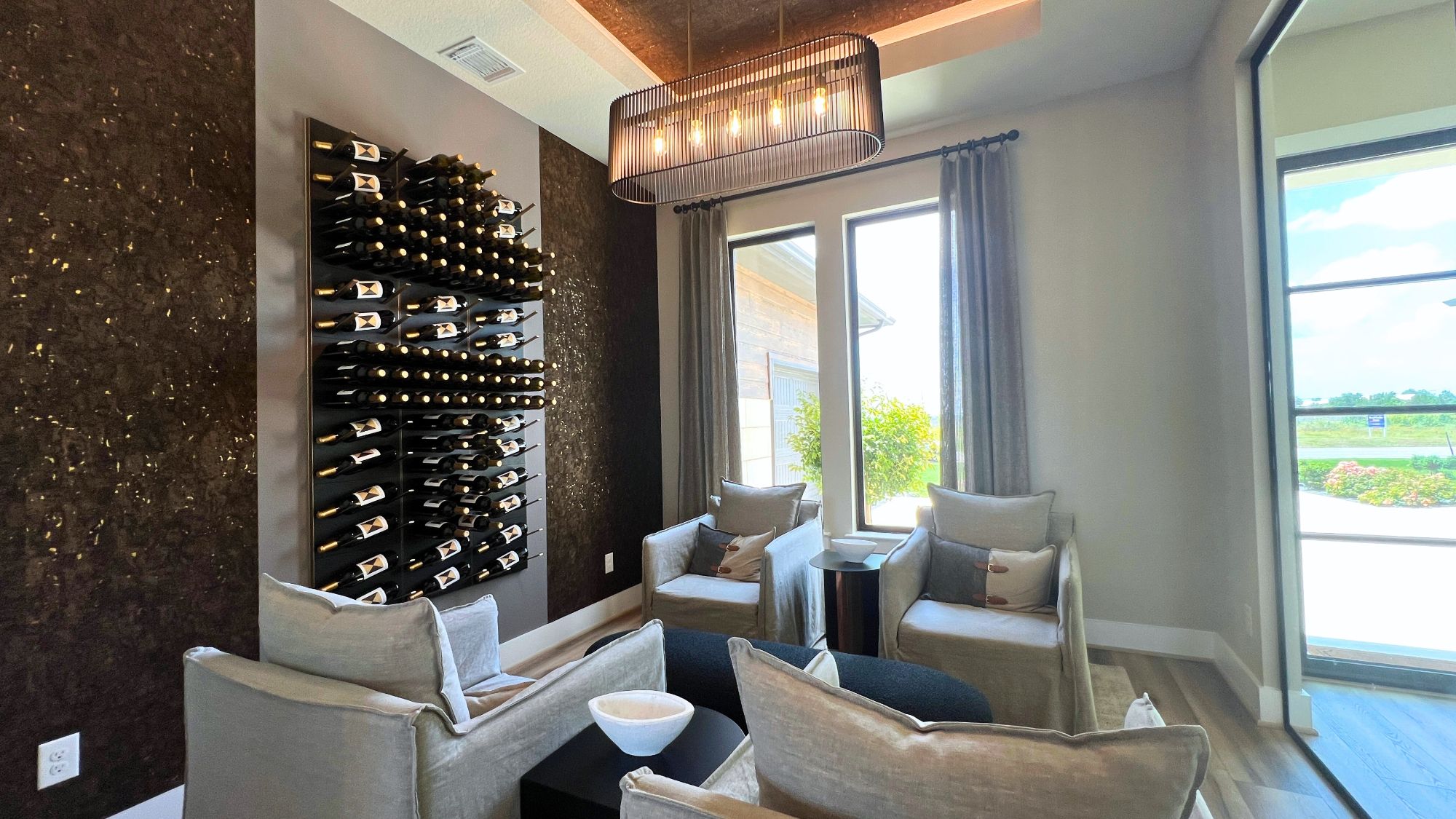 Wine tasting room and luxury entertaining space in the Scott Felder Bulverde model home at Leander Estates in Leander Texas