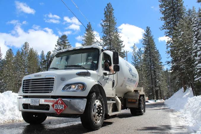 Propane delivery to a buried tank at a Nevada Lake Tahoe home during winter