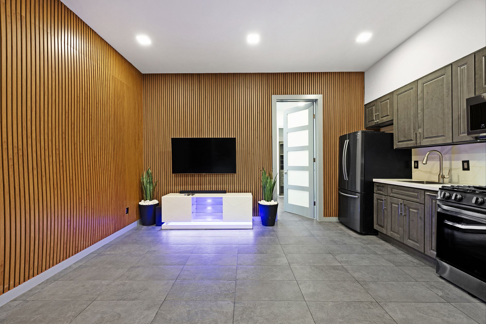 Living area with feature wall at 2335 Market Street