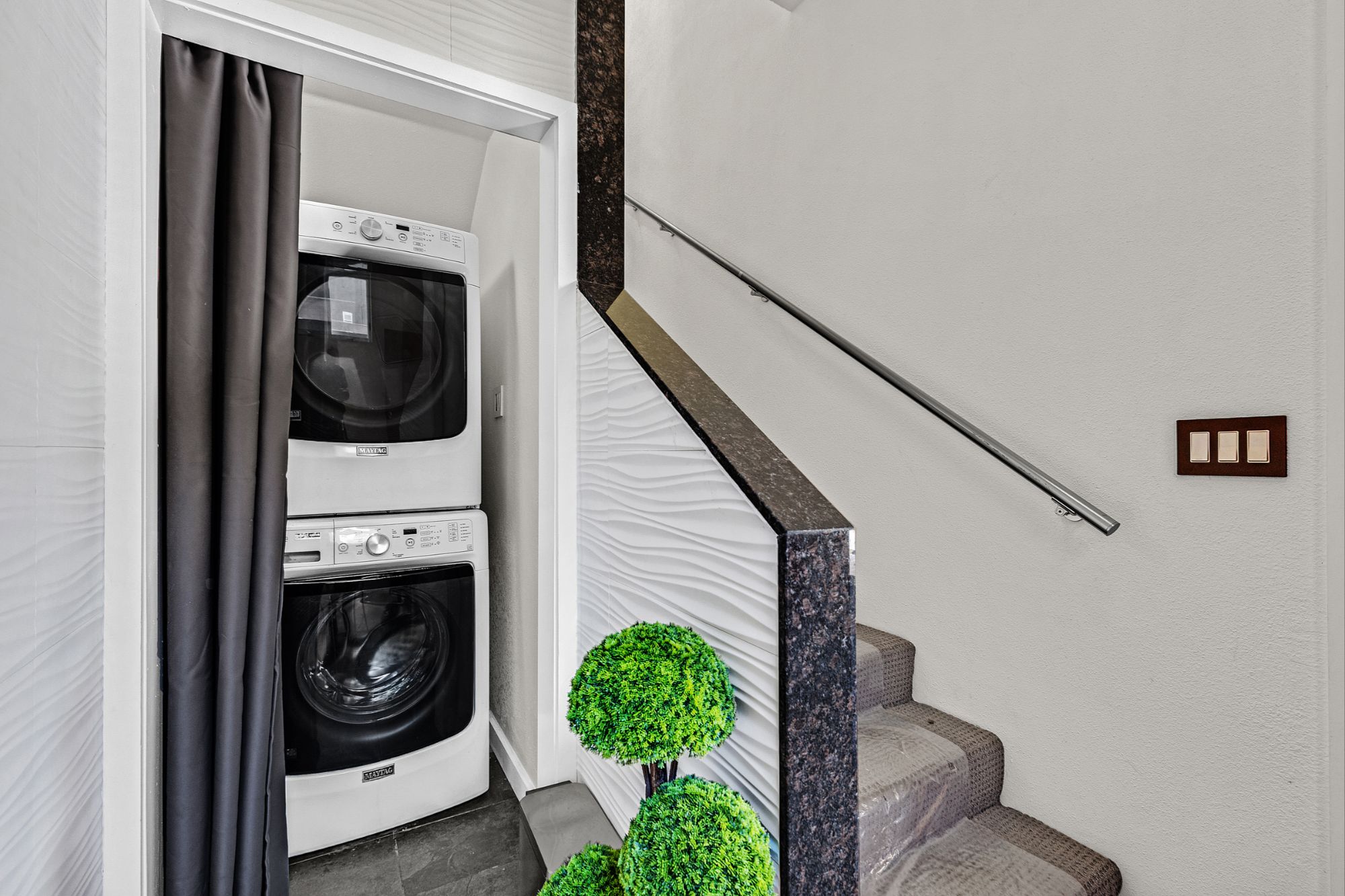 Laundry and stairway at 2335 Market Street