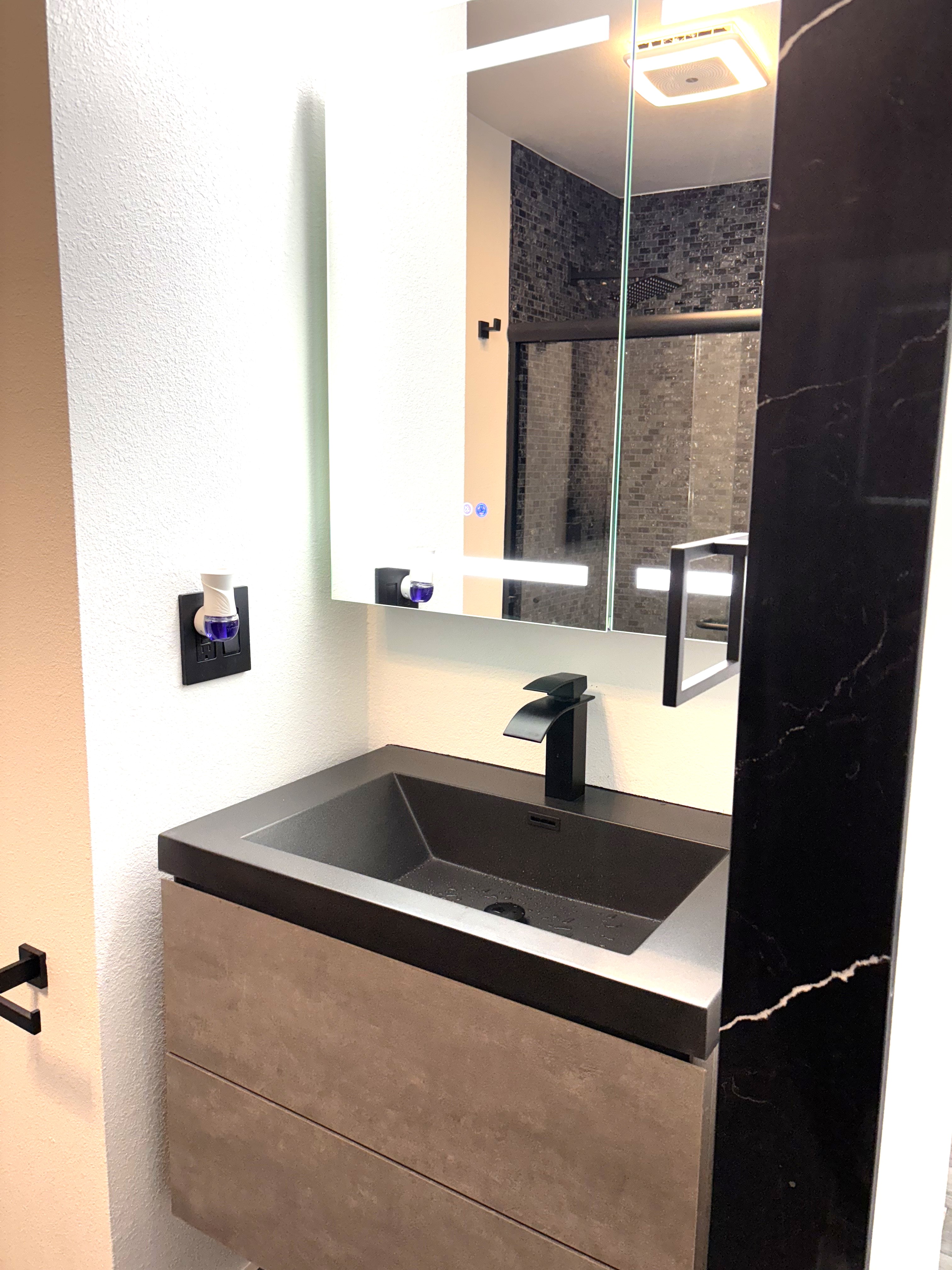 Bathroom vanity and mirror at 1654 25th Avenue
